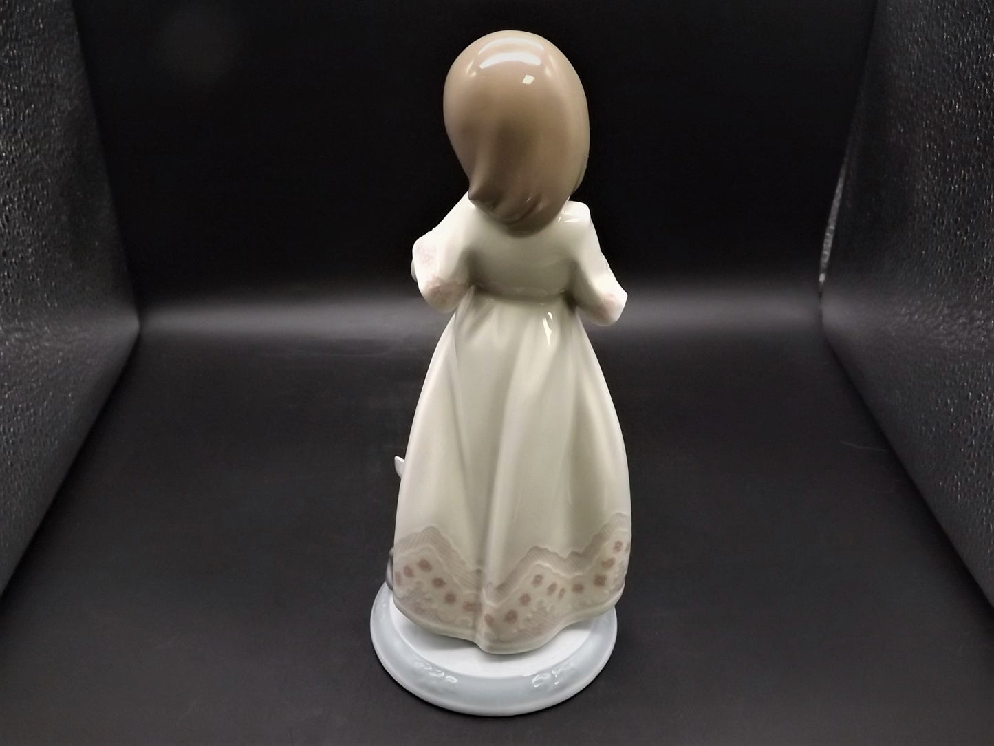 Vintage 1999 Lladro Night before Christmas Collection "A Stocking for kitty" #6669 with original box. Child hanging a stocking for her pet.