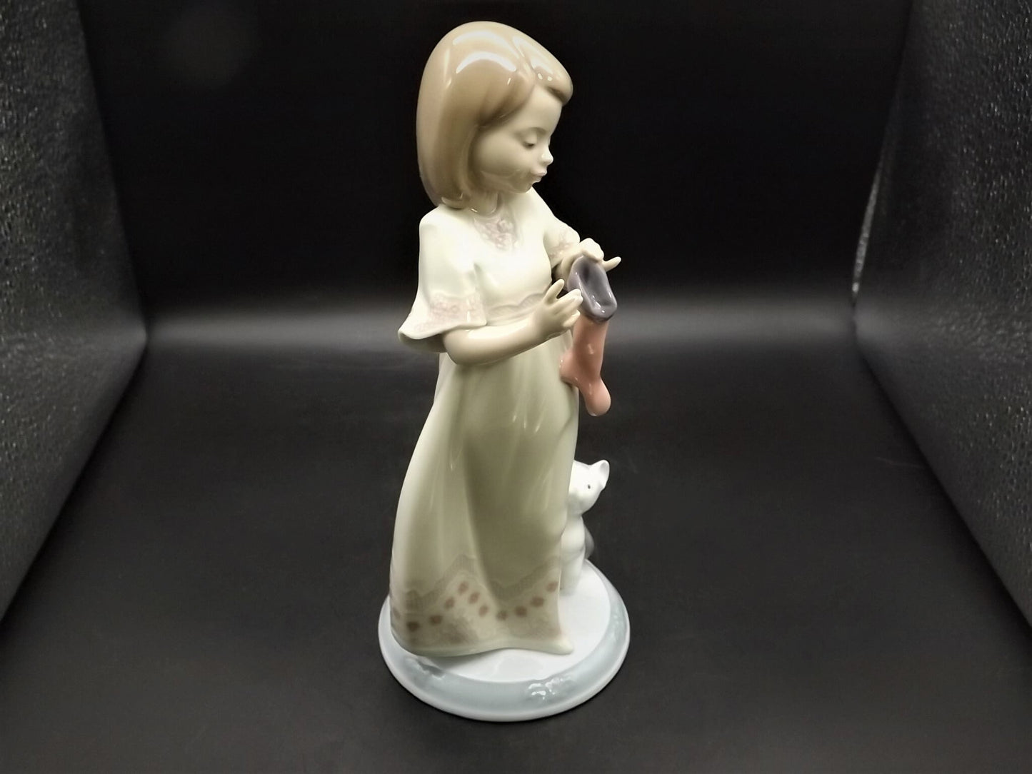 Vintage 1999 Lladro Night before Christmas Collection "A Stocking for kitty" #6669 with original box. Child hanging a stocking for her pet.