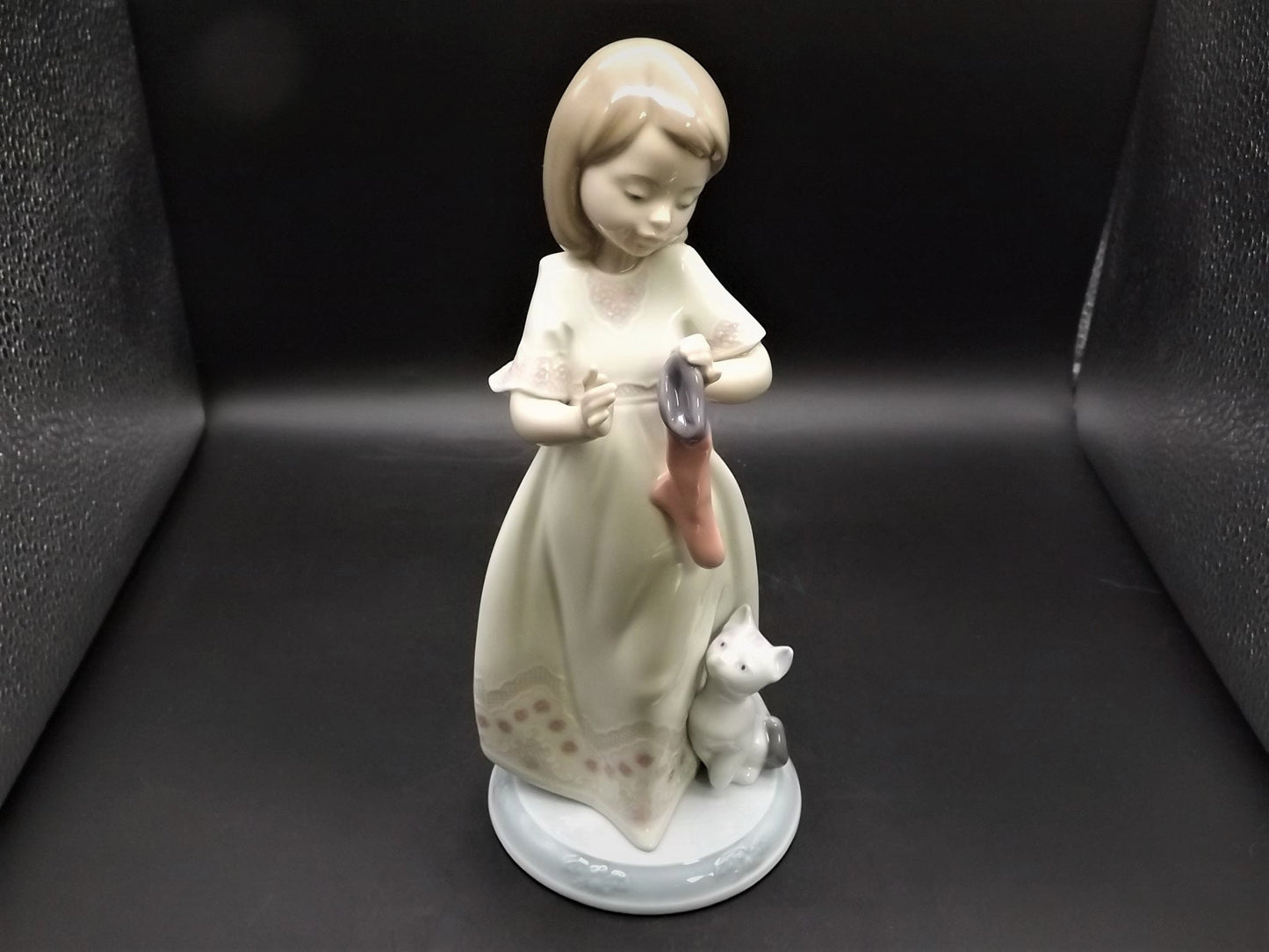 Vintage 1999 Lladro Night before Christmas Collection "A Stocking for kitty" #6669 with original box. Child hanging a stocking for her pet.