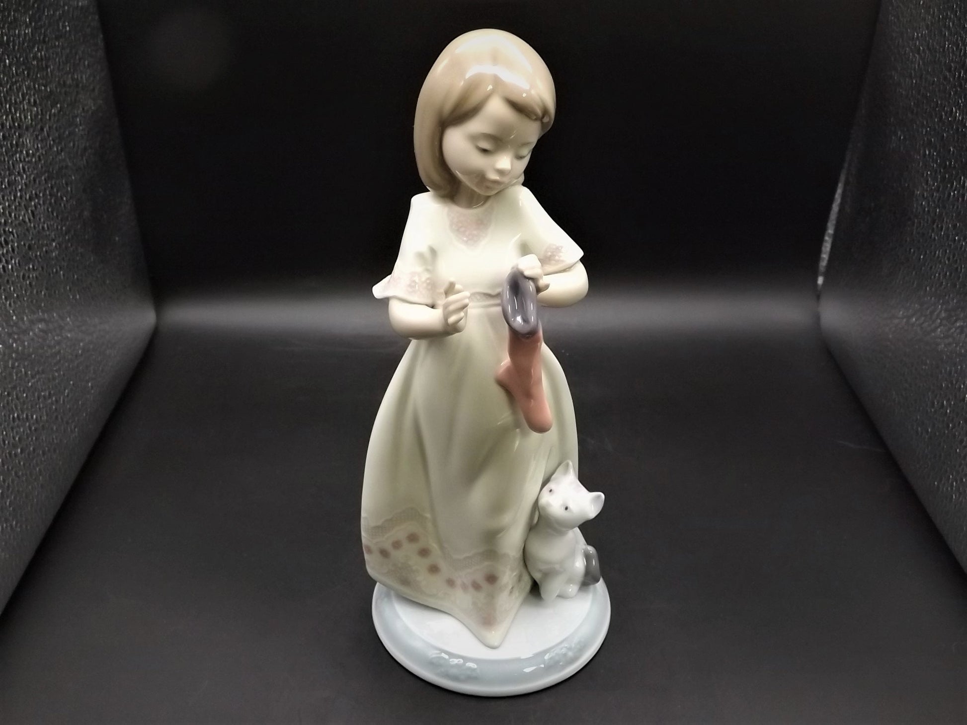 Vintage 1999 Lladro Night before Christmas Collection "A Stocking for kitty" #6669 with original box. Child hanging a stocking for her pet.