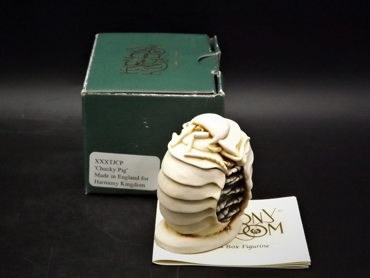 Retired 1995 Harmony Kingdom "Chucky Pig" Jest Figurine XXXTJCP with original box. Excellent condition. Only 300 made! Autographed Twice!