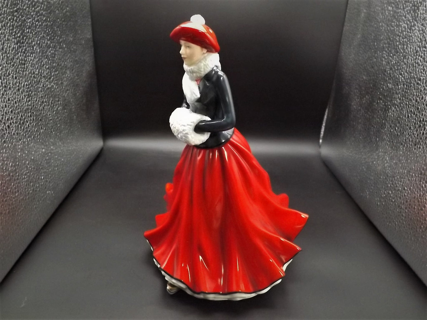 Vintage Royal Doulton Figurine: Christmas Day "Festive Skating" HN 5674