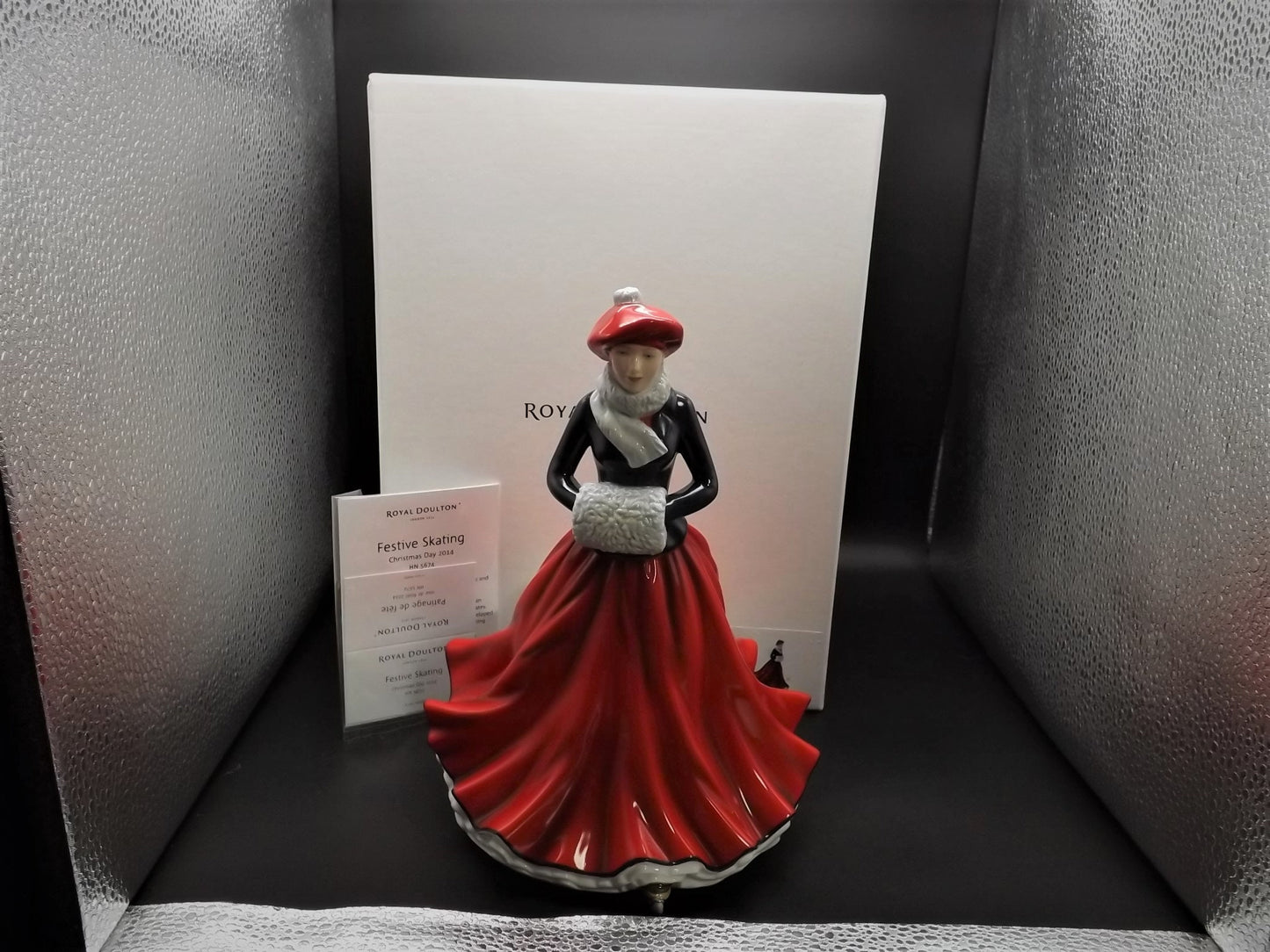 Vintage Royal Doulton Figurine: Christmas Day "Festive Skating" HN 5674