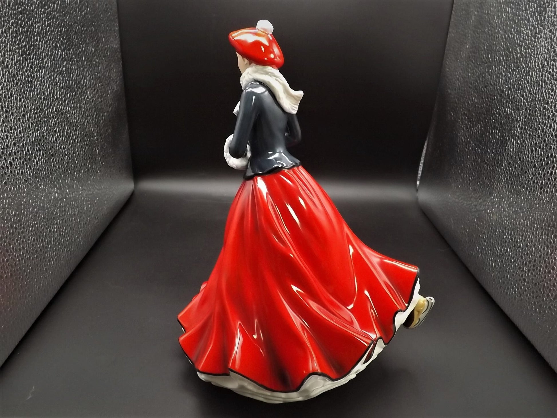 Vintage Royal Doulton Figurine: Christmas Day "Festive Skating" HN 5674