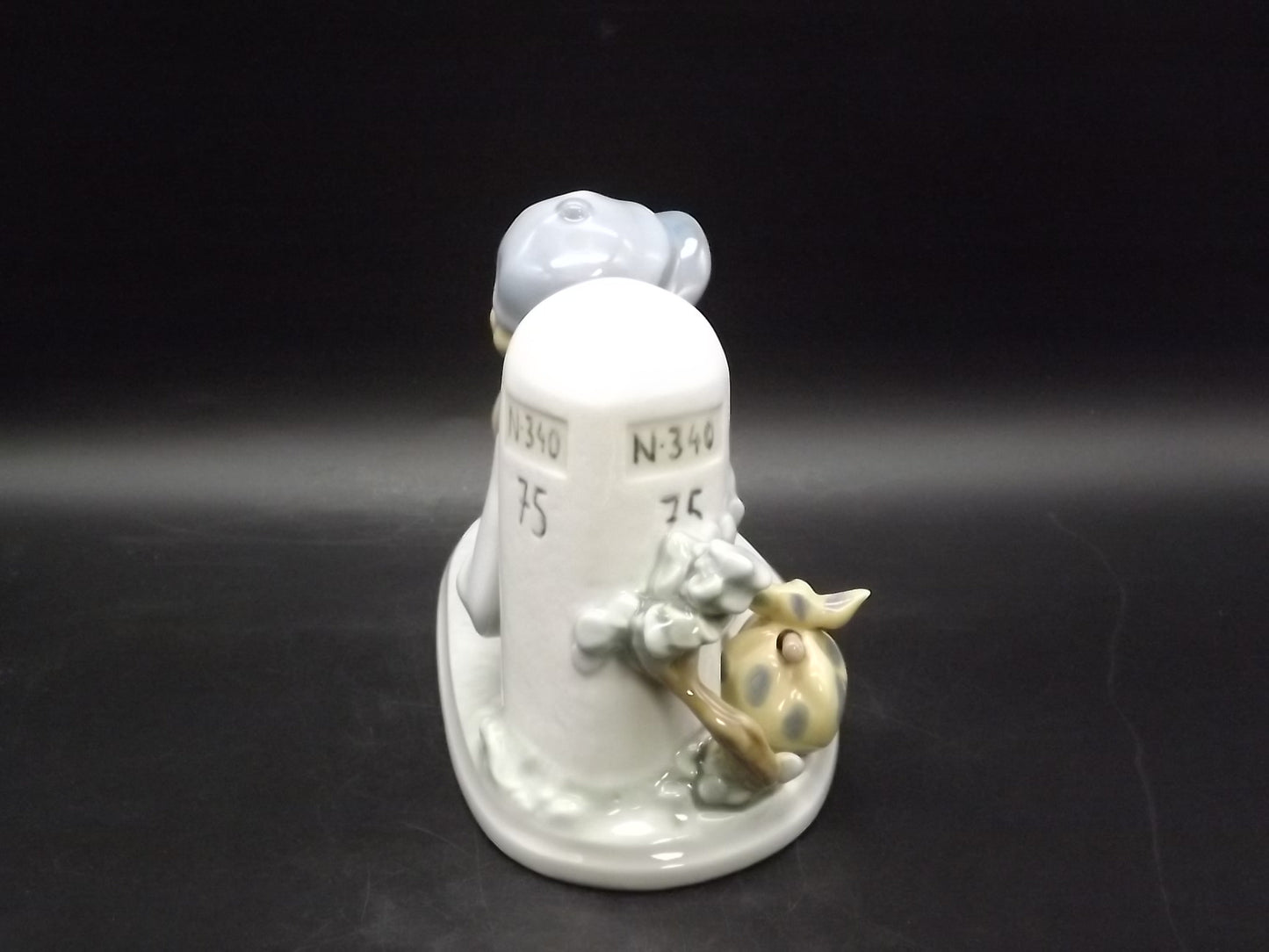 Vintage 1987 Lladro "A time to rest" #5399 no box or COA . Excellent condition! Young Man relaxing on a journey.