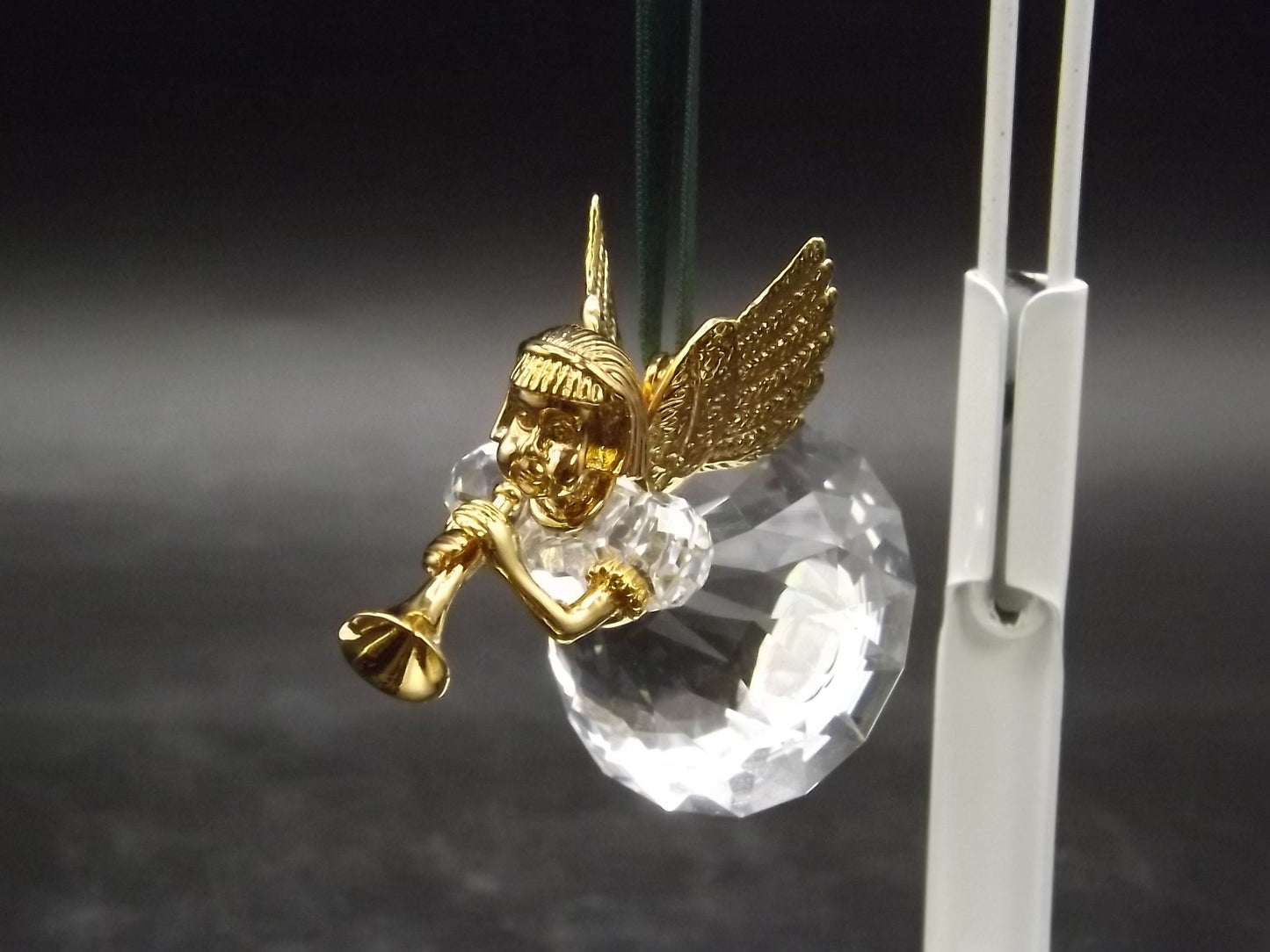 Vintage Swarovski Crystal Memories 1997 "Angel Playing Horn" Figurine. Excellent Condition with original box.