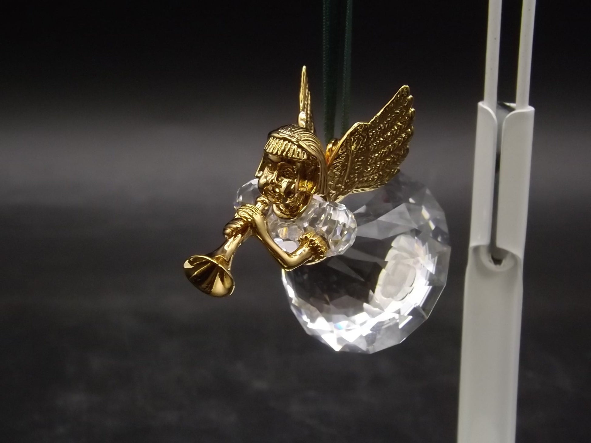 Vintage Swarovski Crystal Memories 1997 "Angel Playing Horn" Figurine. Excellent Condition with original box.