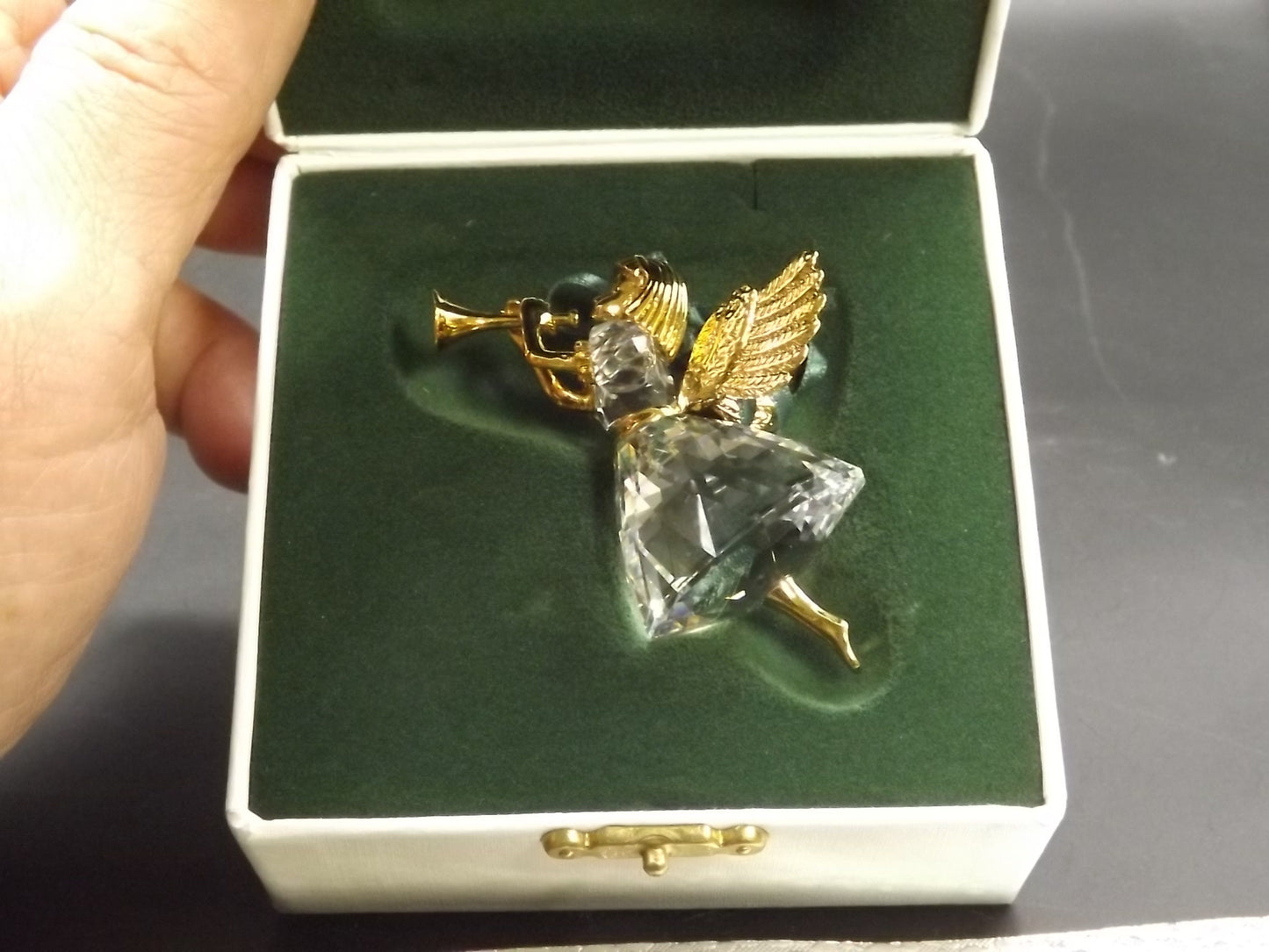 Vintage Swarovski Crystal Memories 1997 "Angel Playing Horn" Figurine. Excellent Condition with original box.