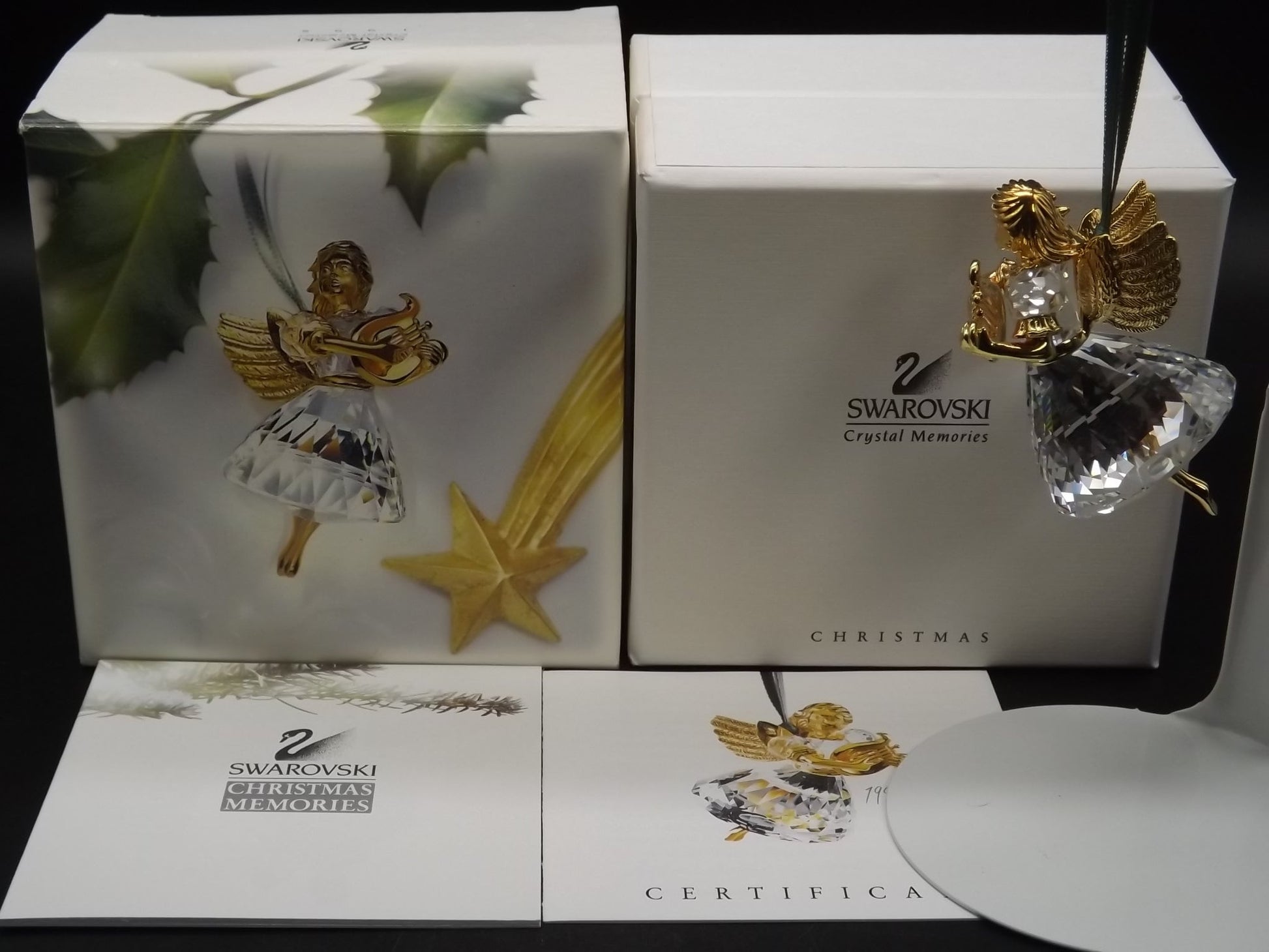 Vintage Swarovski Crystal Memories 1998 "Angel Playing a Harp" Figurine. Excellent Condition with original box.