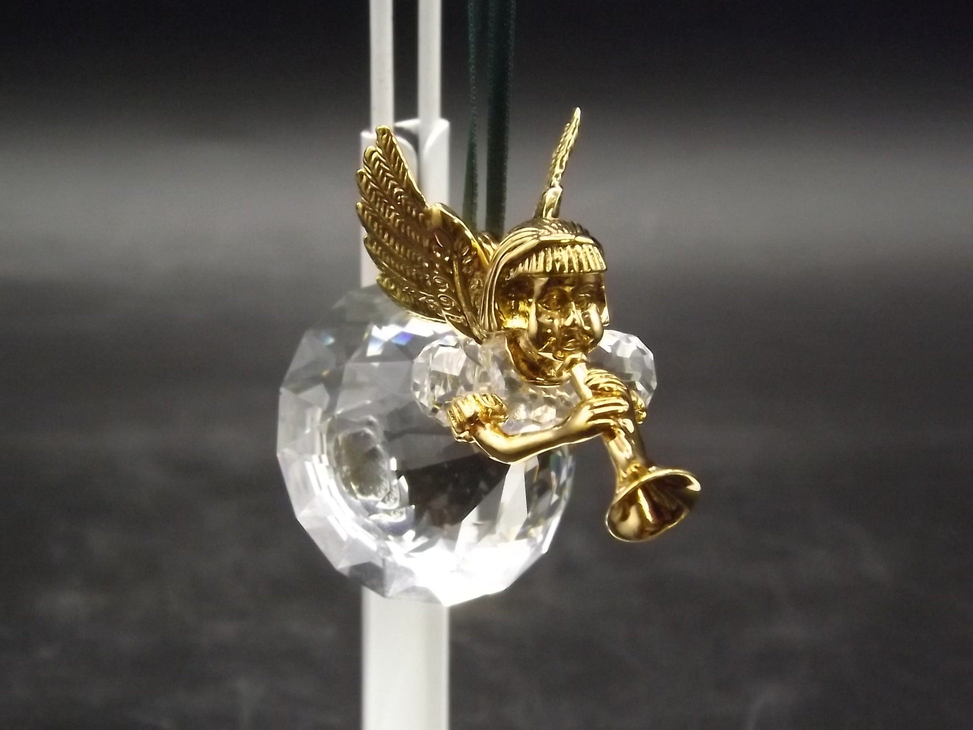 Vintage Swarovski Crystal Memories 1997 "Angel Playing Horn" Figurine. Excellent Condition with original box.