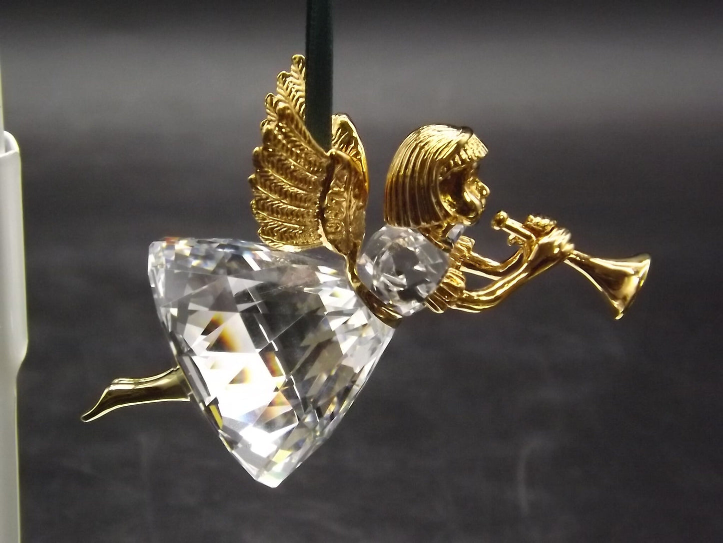 Vintage Swarovski Crystal Memories 1997 "Angel Playing Horn" Figurine. Excellent Condition with original box.