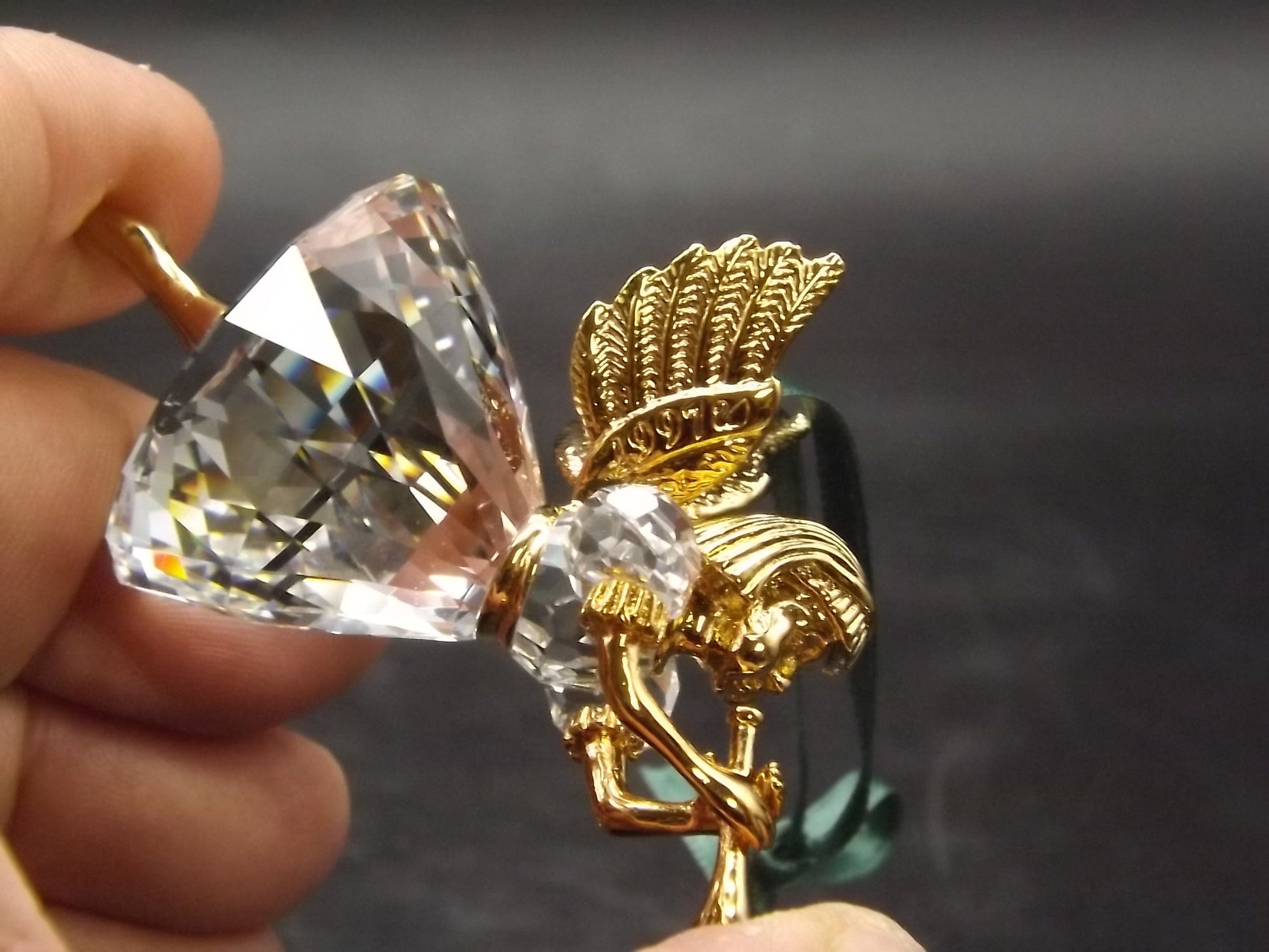 Vintage Swarovski Crystal Memories 1997 "Angel Playing Horn" Figurine. Excellent Condition with original box.