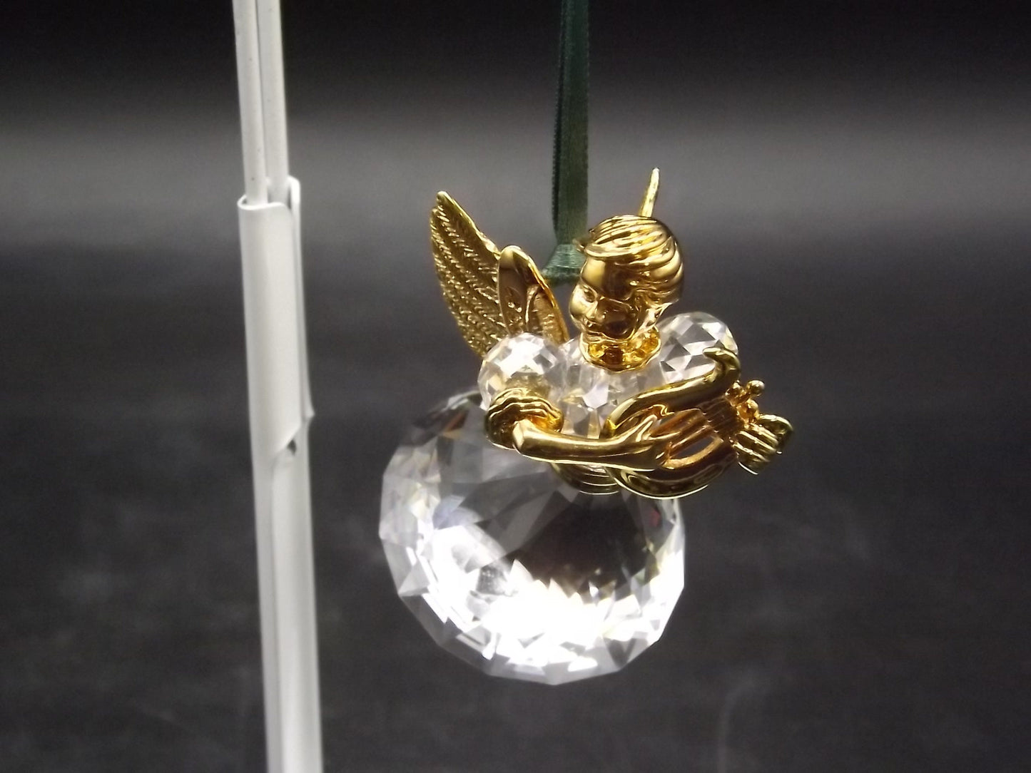 Vintage Swarovski Crystal Memories 1998 "Angel Playing a Harp" Figurine. Excellent Condition with original box.