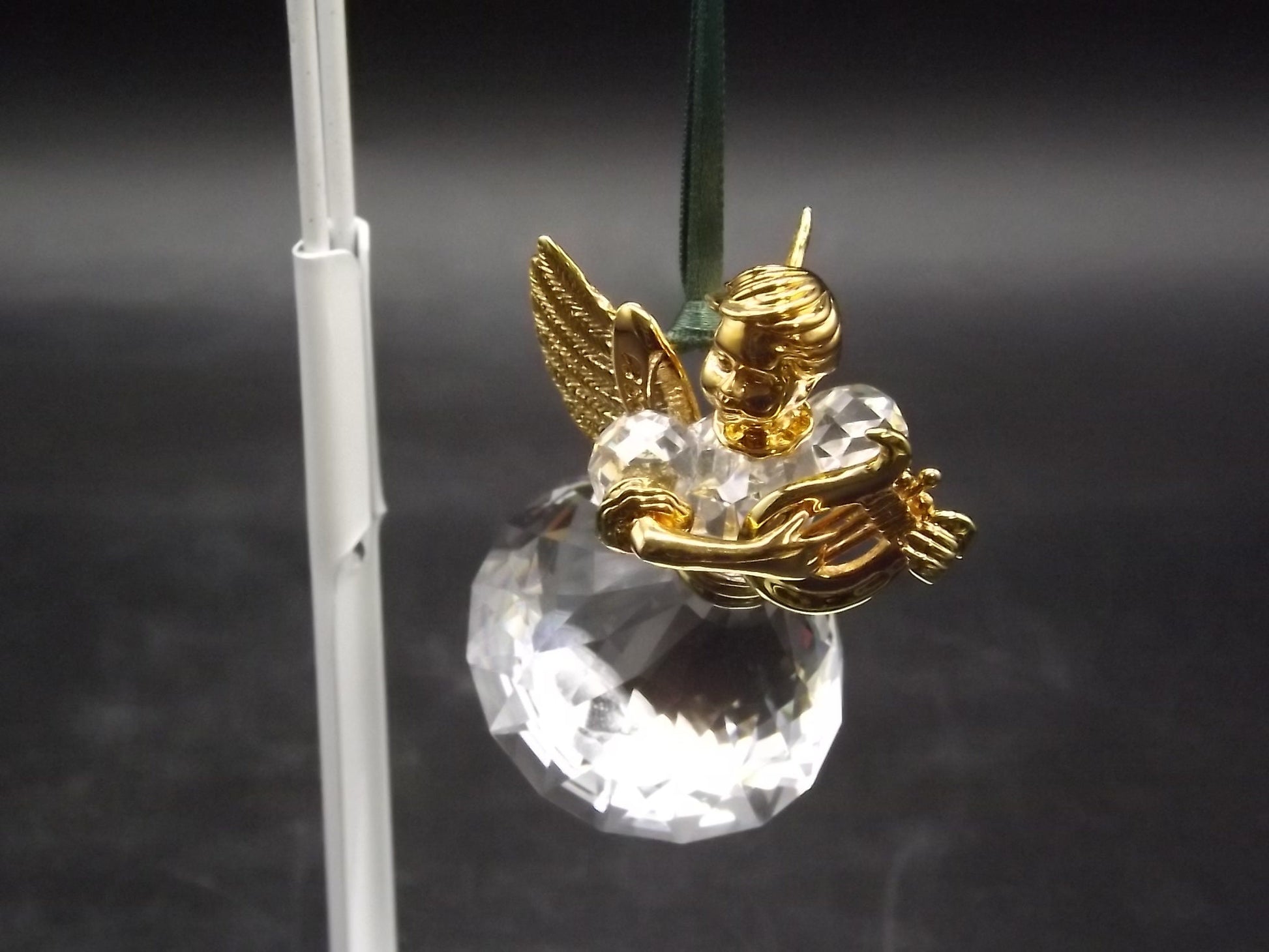 Vintage Swarovski Crystal Memories 1998 "Angel Playing a Harp" Figurine. Excellent Condition with original box.