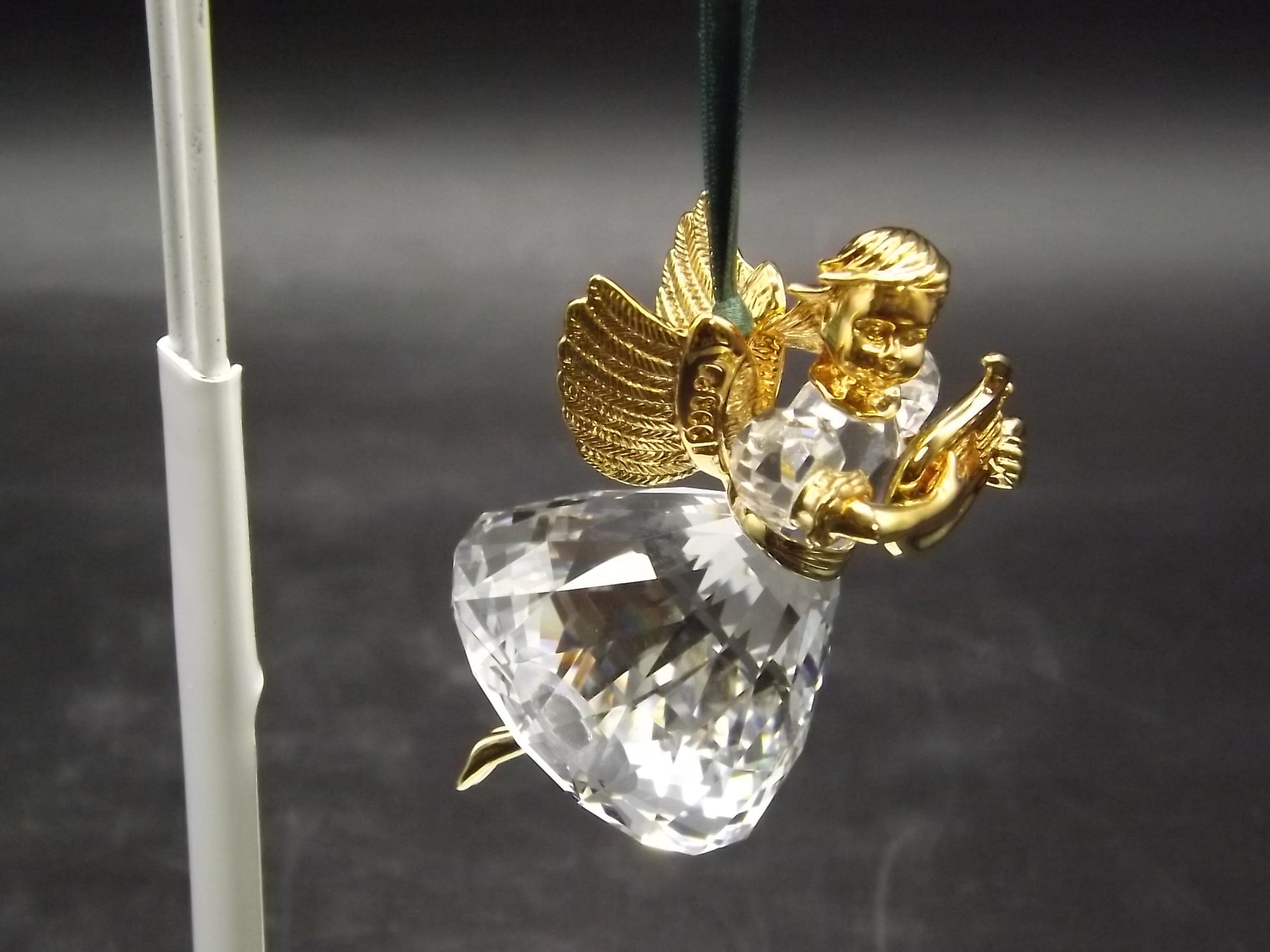 Vintage Swarovski Crystal Memories 1998 "Angel Playing a Harp" Figurine. Excellent Condition with original box.