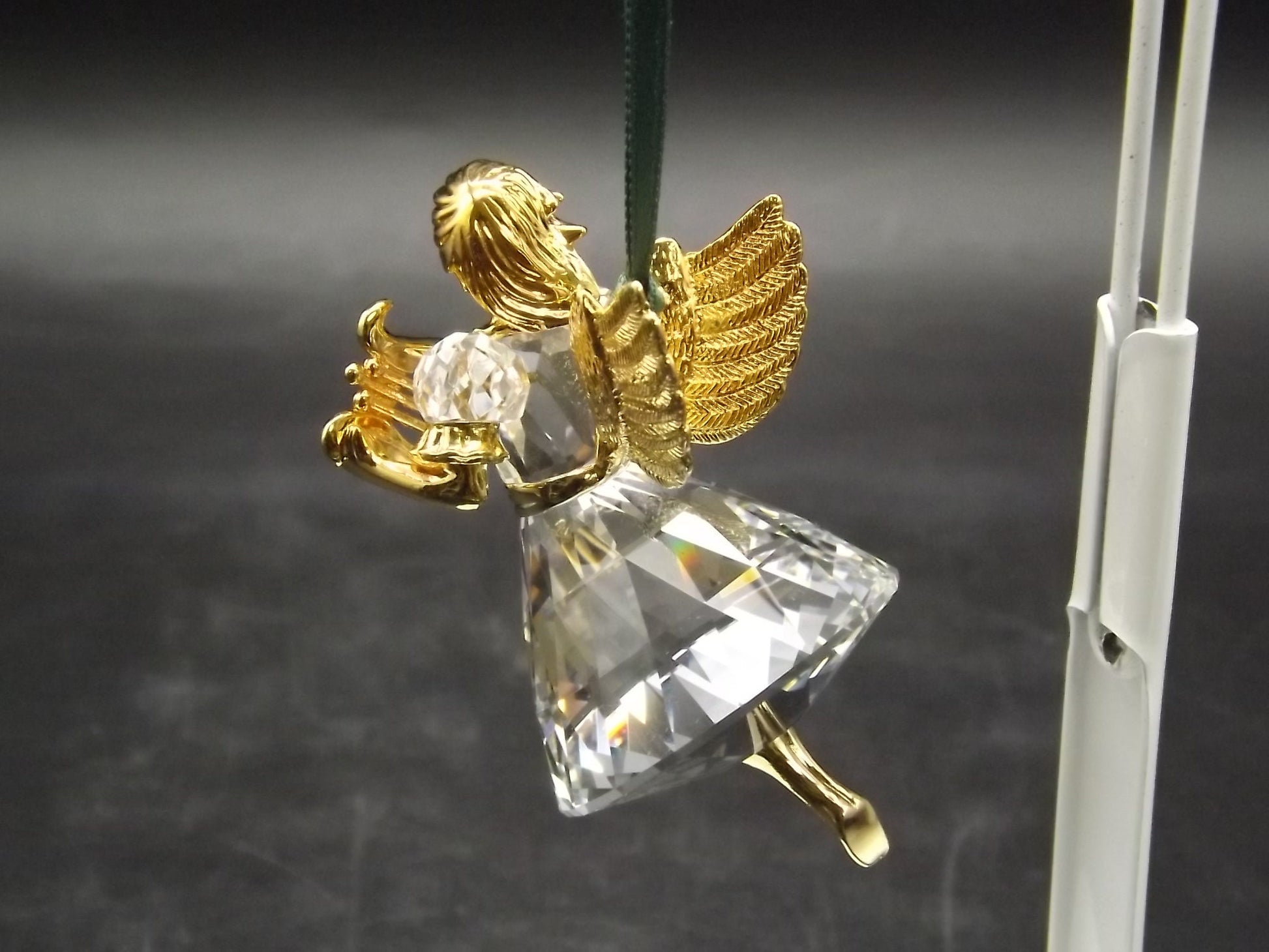 Vintage Swarovski Crystal Memories 1998 "Angel Playing a Harp" Figurine. Excellent Condition with original box.