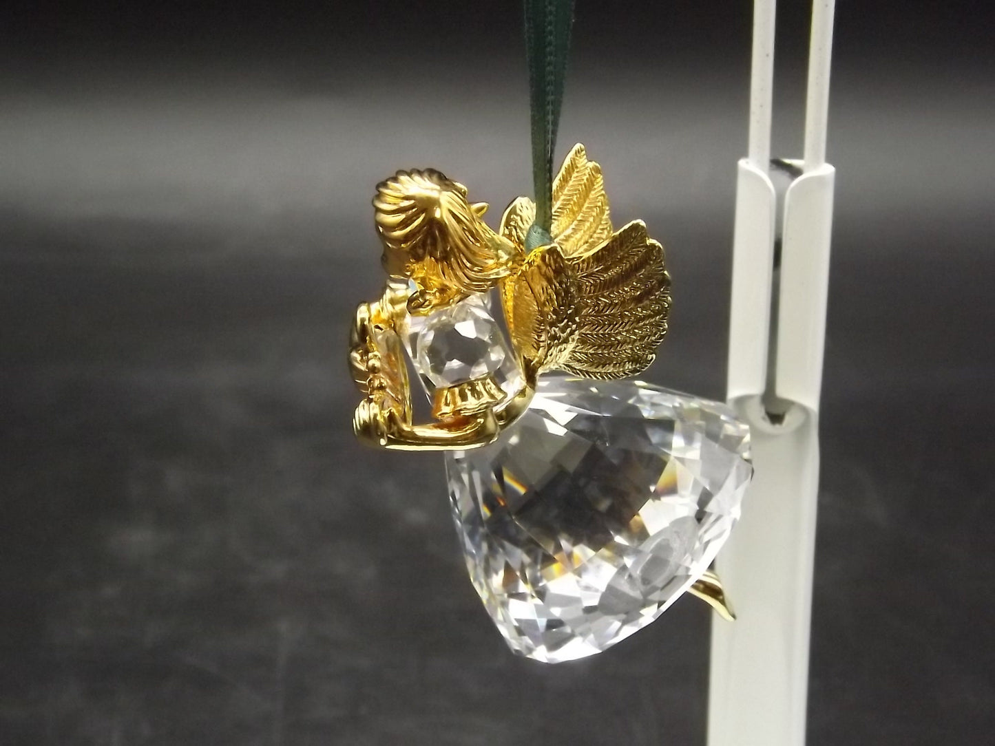 Vintage Swarovski Crystal Memories 1998 "Angel Playing a Harp" Figurine. Excellent Condition with original box.