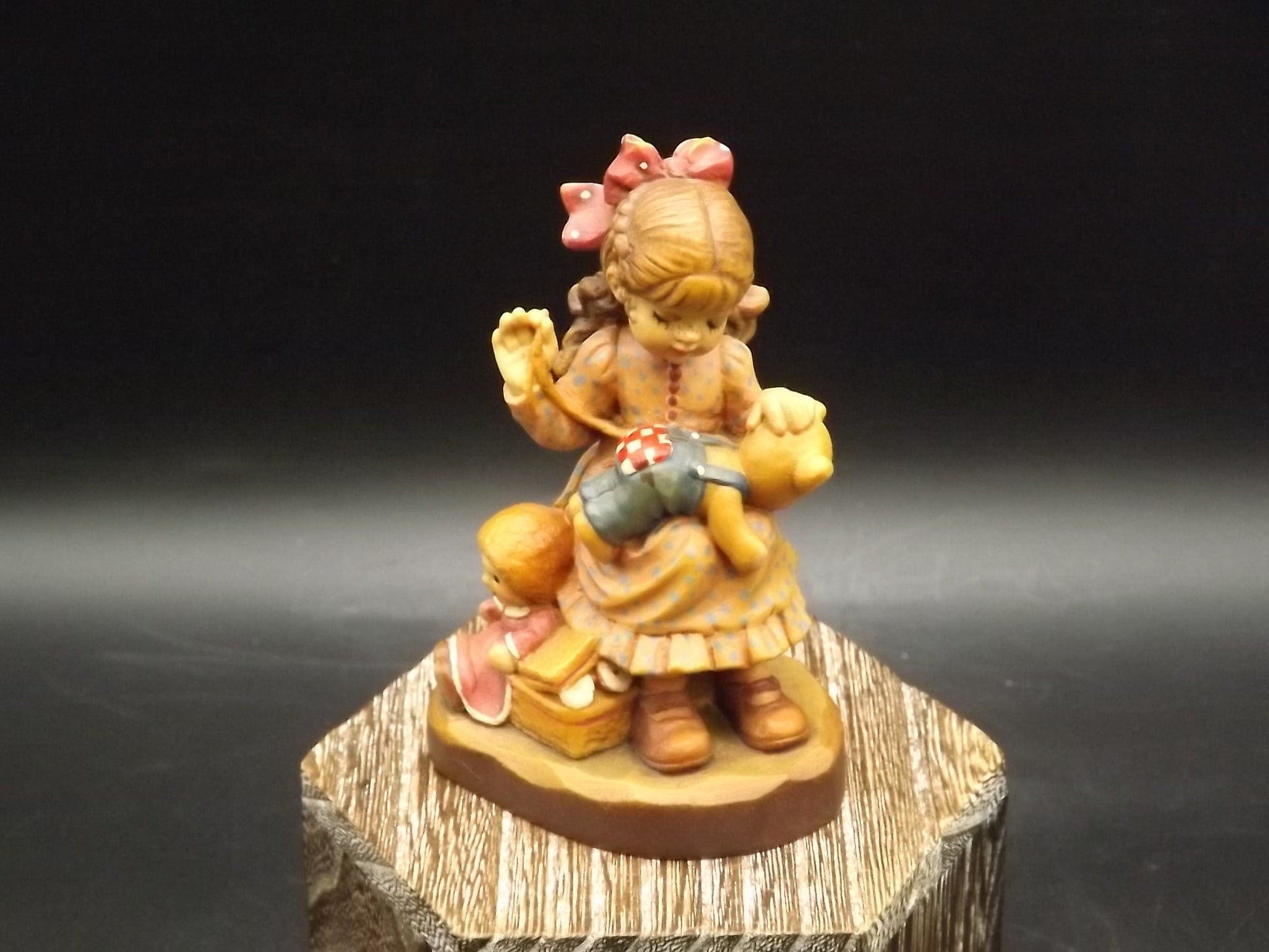 Vintage Anri "Good as new" carved wood figurine. Designed by Sarah Kay numbered 2057/4000. Young girl repairing her Teddy Bear.
