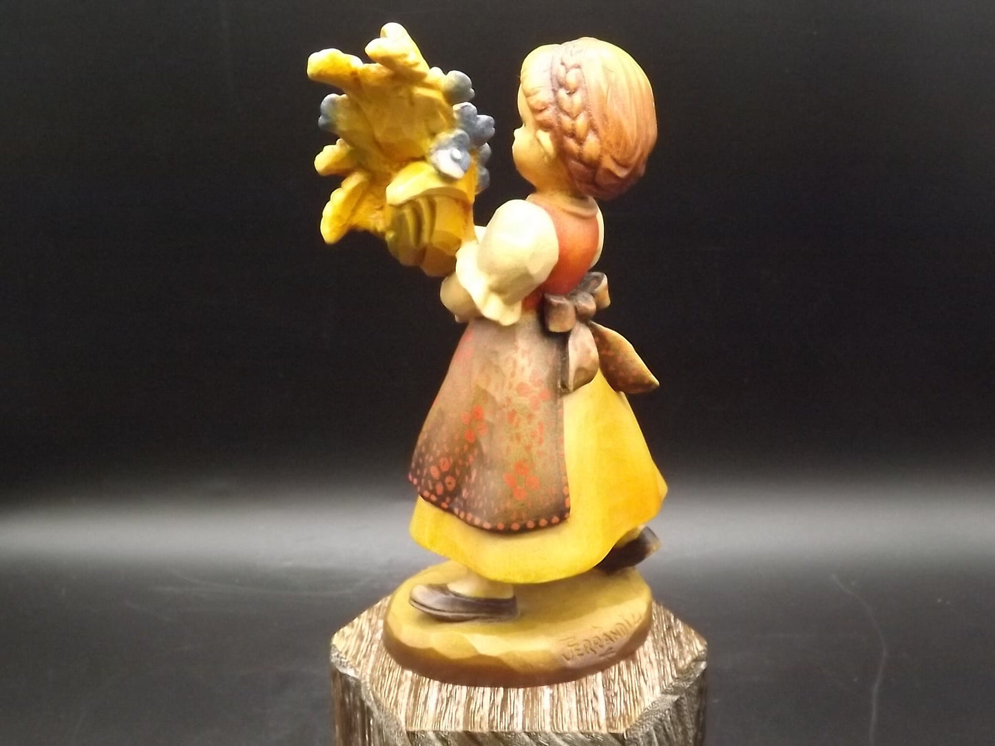 Vintage Anri "Golden Sheaves" carved wood figurine. Designed by Juan Ferrandiz numbered 338/2250. Young girl holding a sheaf of grain.