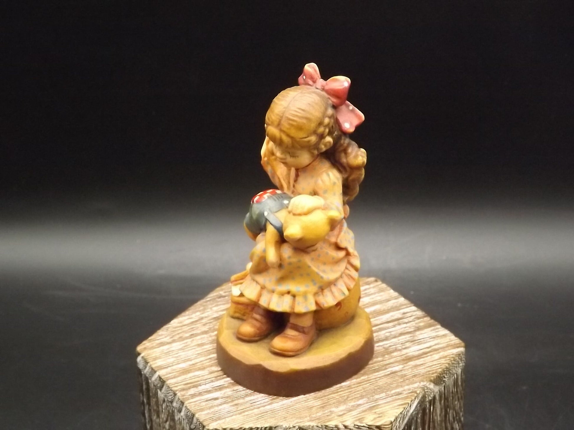 Vintage Anri "Good as new" carved wood figurine. Designed by Sarah Kay numbered 2057/4000. Young girl repairing her Teddy Bear.