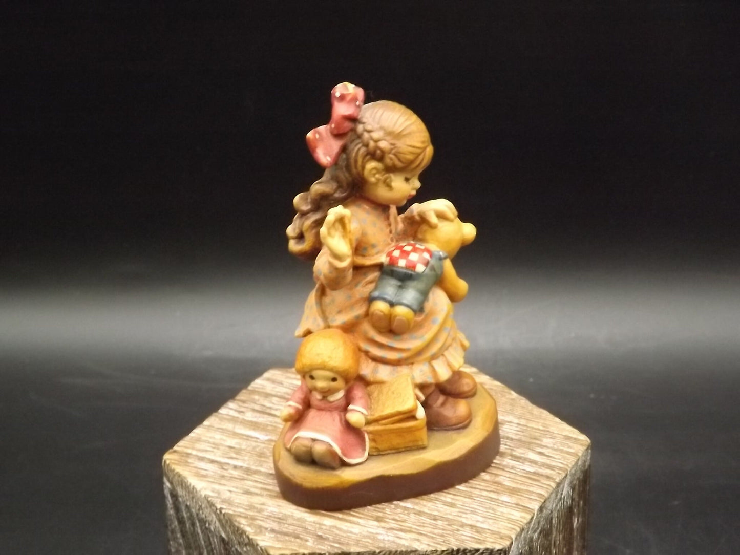 Vintage Anri "Good as new" carved wood figurine. Designed by Sarah Kay numbered 2057/4000. Young girl repairing her Teddy Bear.
