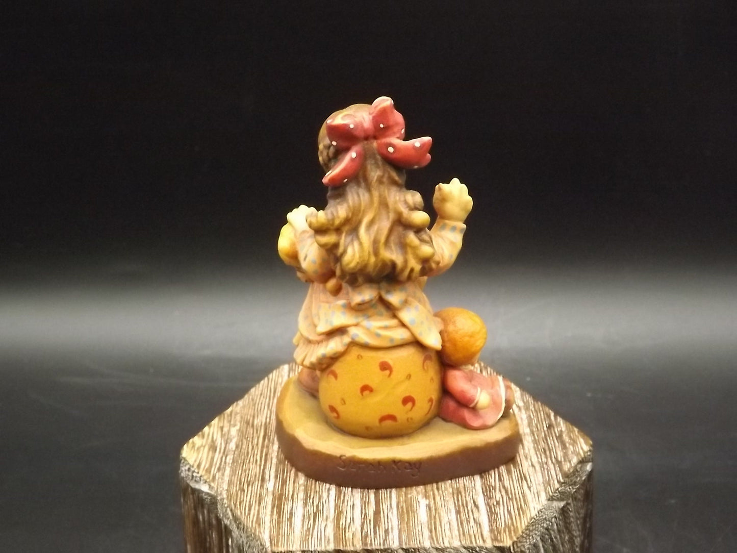 Vintage Anri "Good as new" carved wood figurine. Designed by Sarah Kay numbered 2057/4000. Young girl repairing her Teddy Bear.