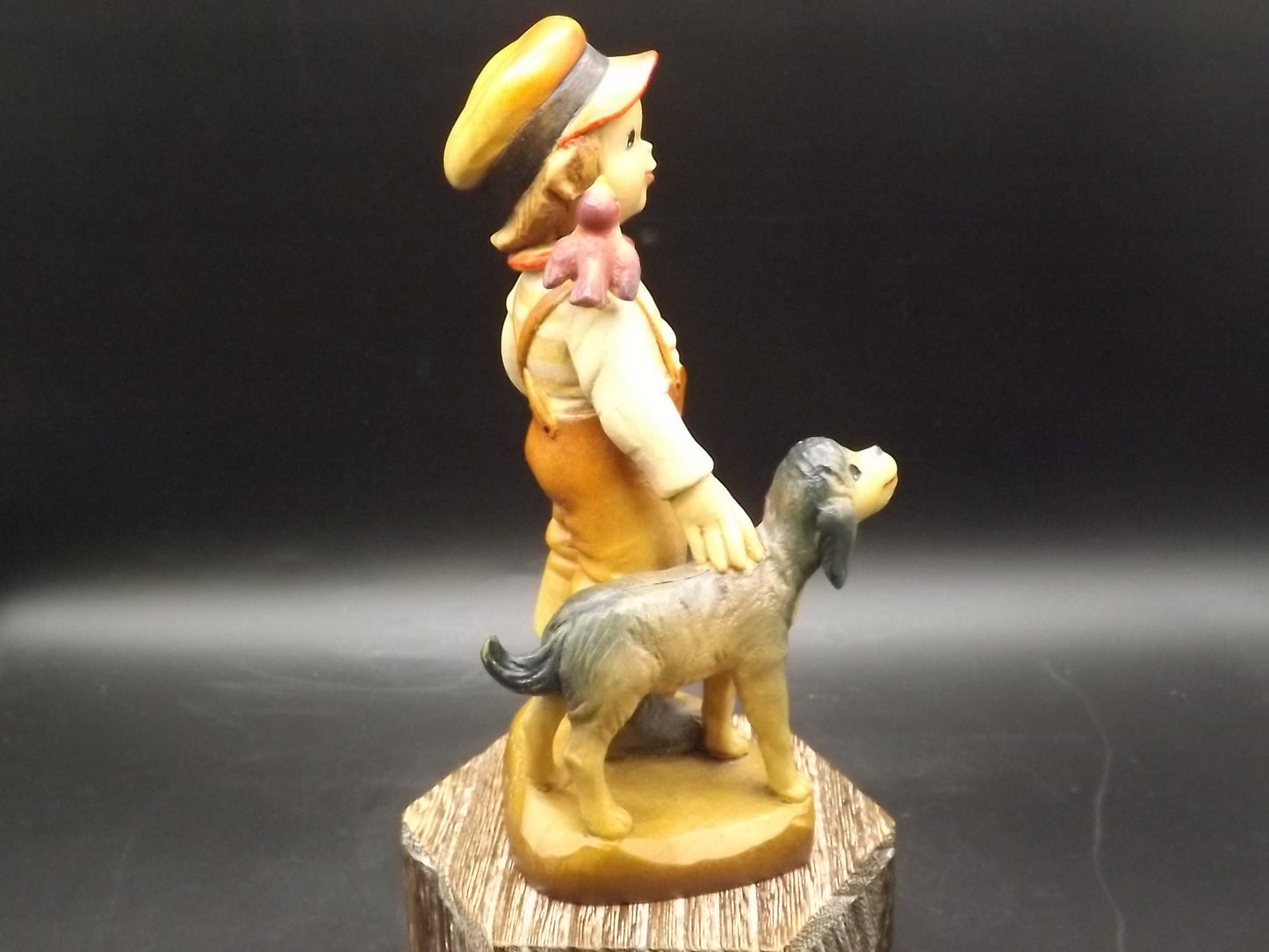 Vintage Anri "High Hopes" carved wood figurine. Designed by Juan Ferrandiz. Young boy with his pet dog and a bird perched on his shoulder.
