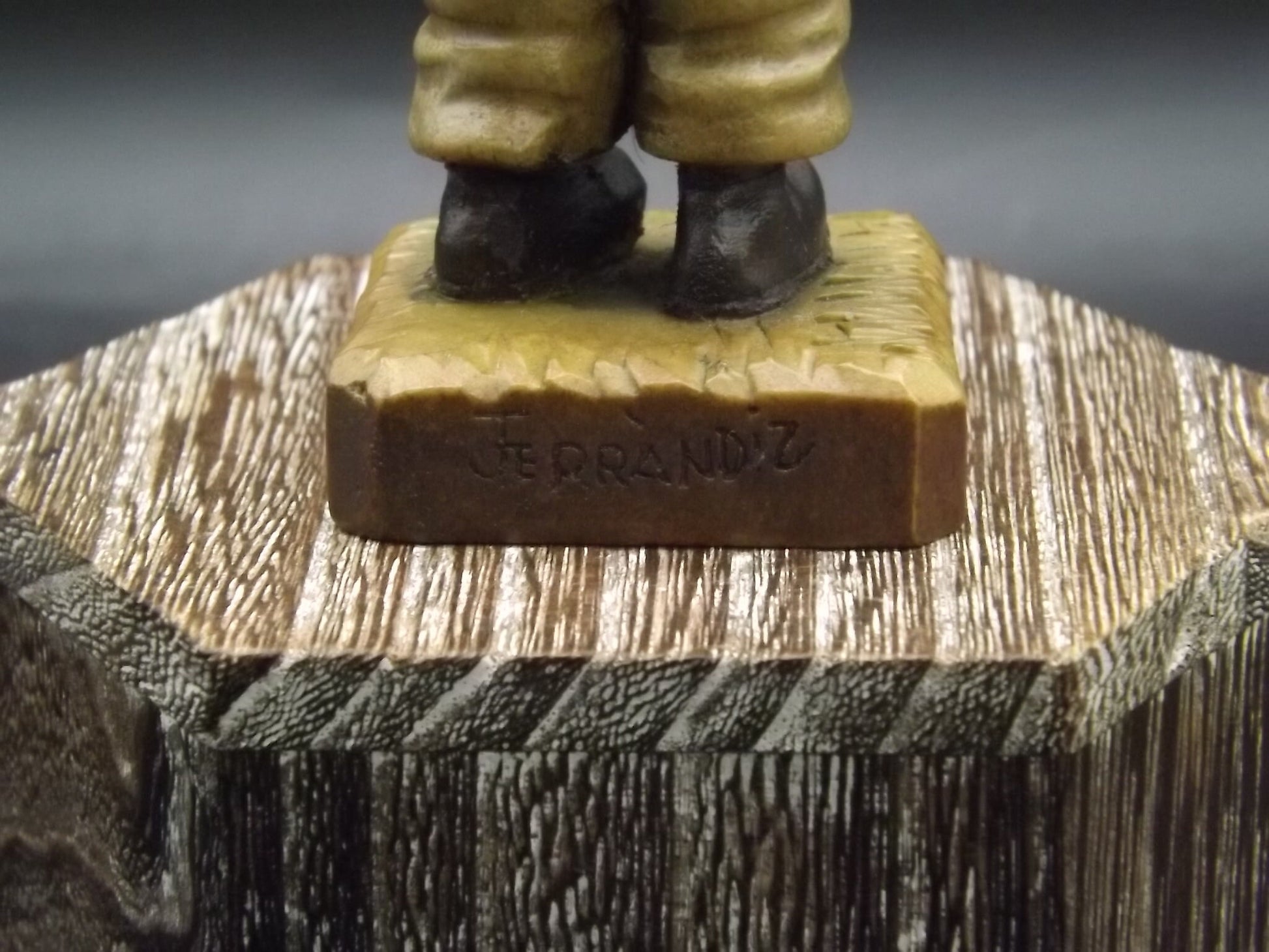 Vintage Anri "Harvest Time" Dark Blue carved wood figurine. Designed by Juan Ferrandiz. Young boy carrying a basket of grapes. Number 4 Club