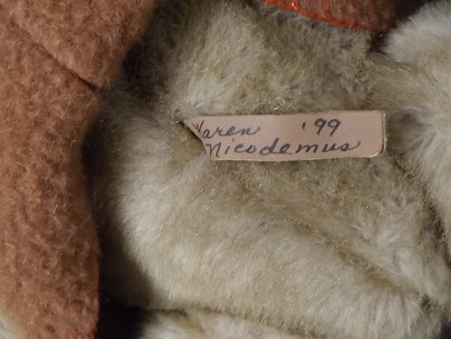 Vintage 1999 artist crafted Teddy Bear. This jointed bear is well crafted by Karen Nicodemus who creates by repurposing old coats into art.
