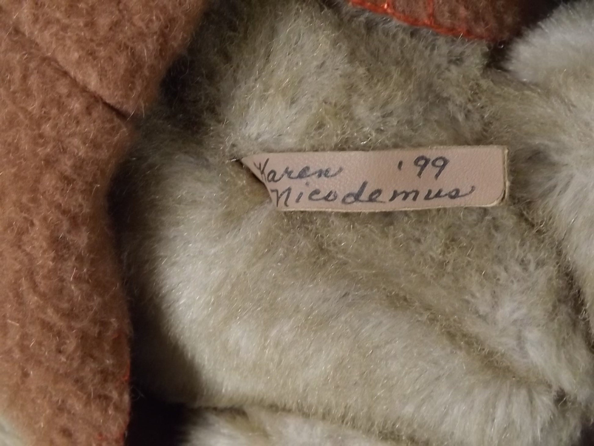 Vintage 1999 artist crafted Teddy Bear. This jointed bear is well crafted by Karen Nicodemus who creates by repurposing old coats into art.