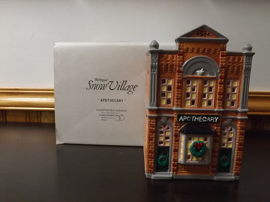 Vintage 1986 Snow Village "Apothecary" Drug Store building figurine for seasonal display village scenes. With box.