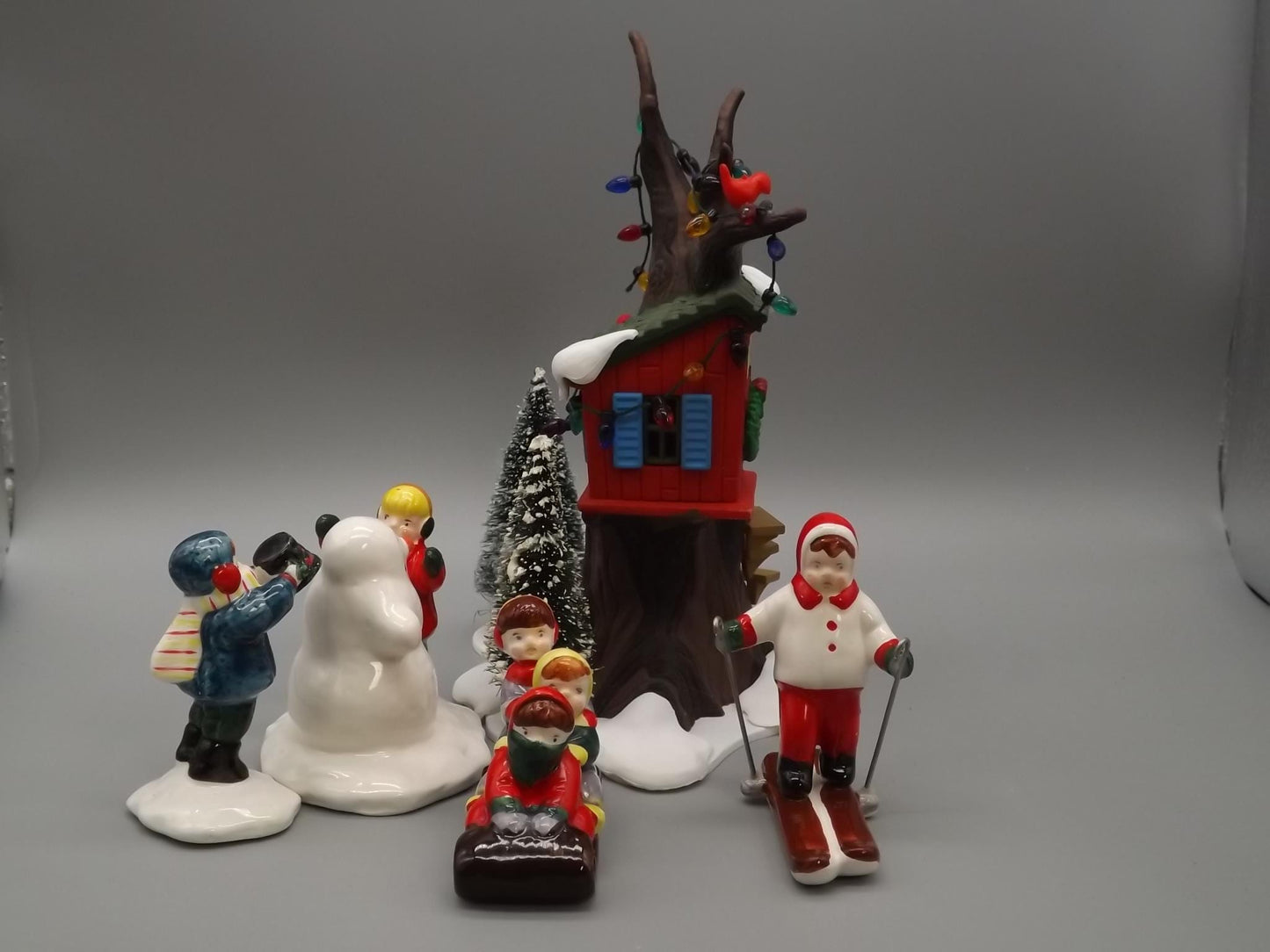 Vintage Snow Village "Kids Tree House and Snow Kids" figurines seasonal display children playing in the snow. With box