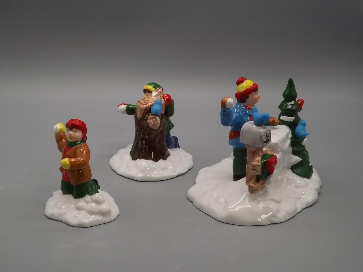 Vintage #5414-3 Snow Village "Snowball fort" Children having an old fashioned snowball fight for seasonal village scenes. With box.