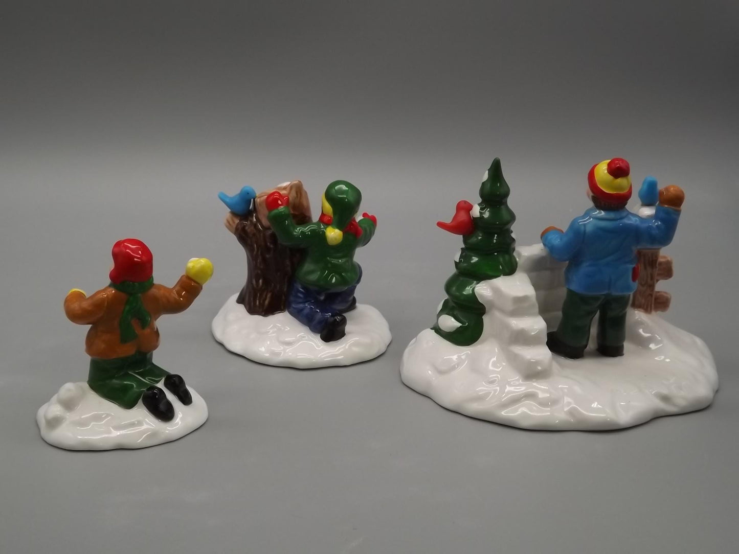 Vintage #5414-3 Snow Village "Snowball fort" Children having an old fashioned snowball fight for seasonal village scenes. With box.