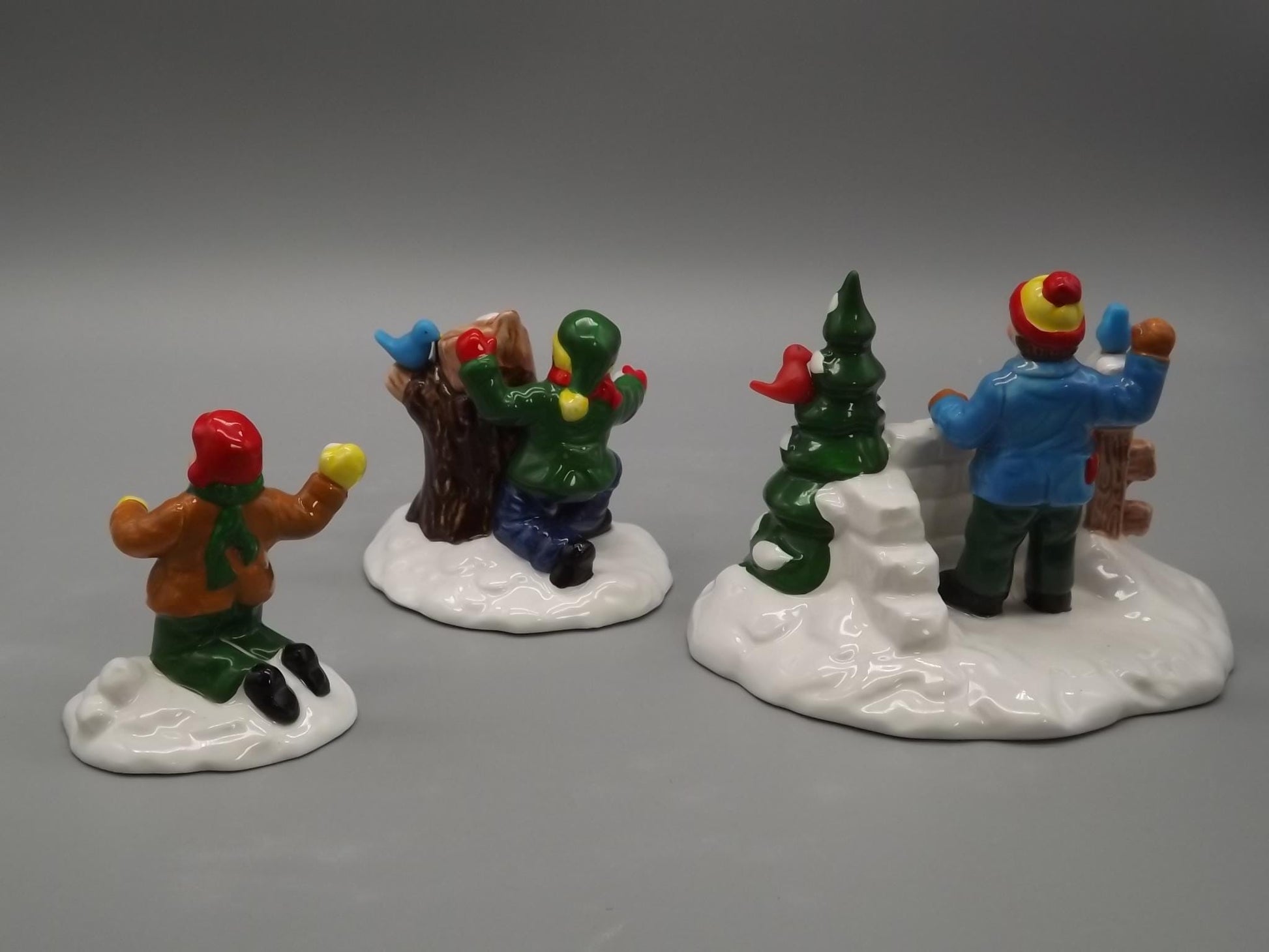 Vintage #5414-3 Snow Village "Snowball fort" Children having an old fashioned snowball fight for seasonal village scenes. With box.