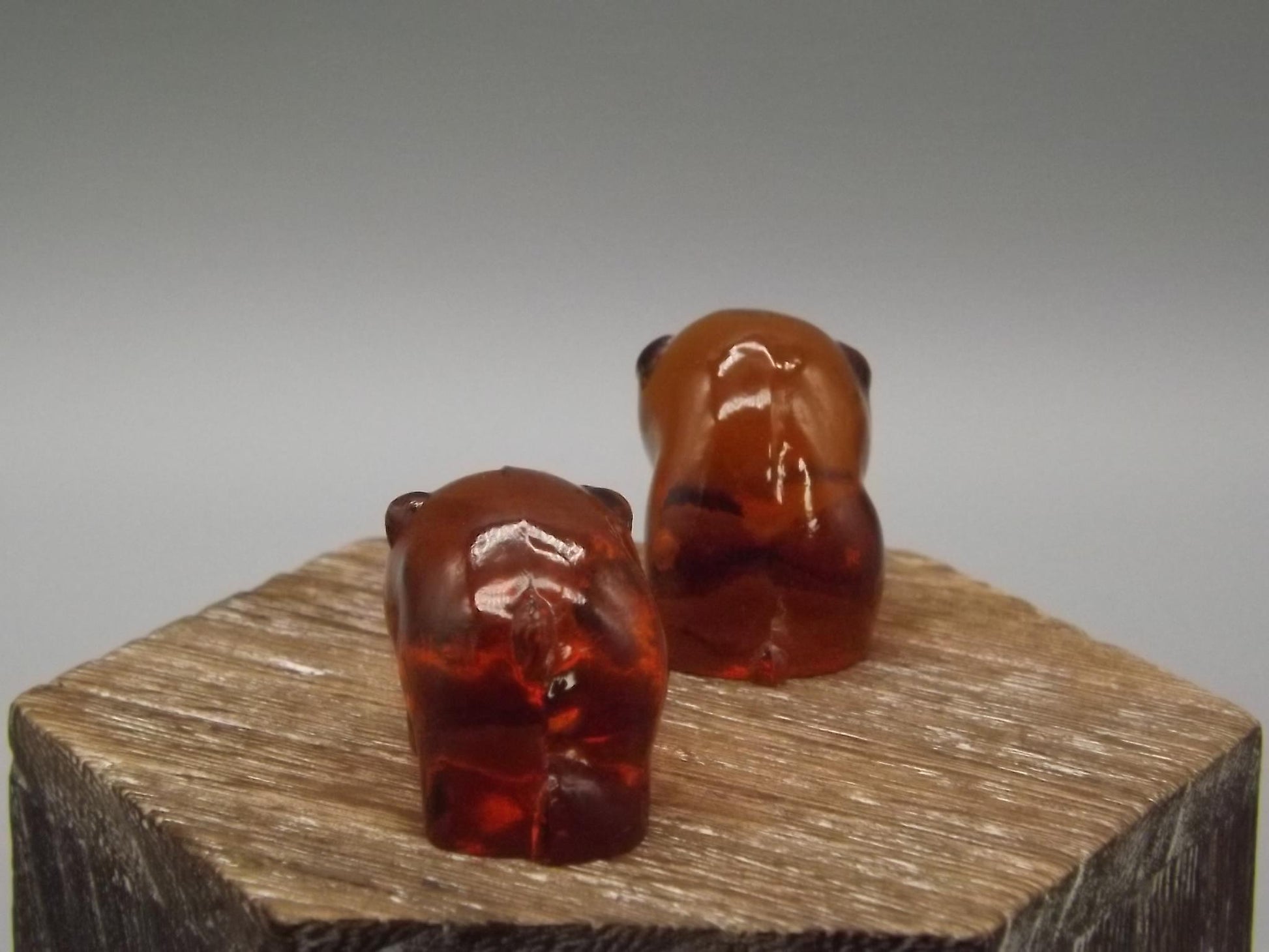 Heisey by Imperial Amber glass standing and sitting piglets set.