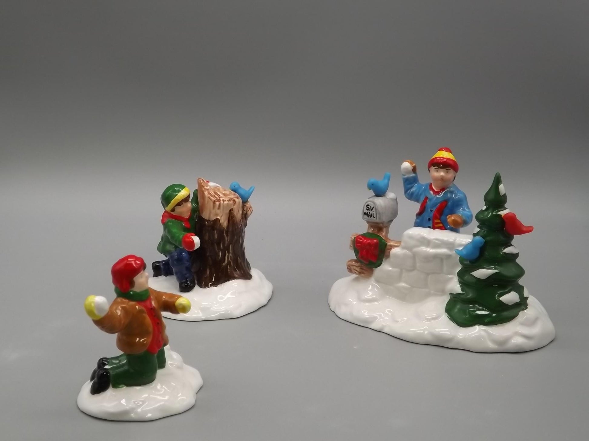 Vintage #5414-3 Snow Village "Snowball fort" Children having an old fashioned snowball fight for seasonal village scenes. With box.