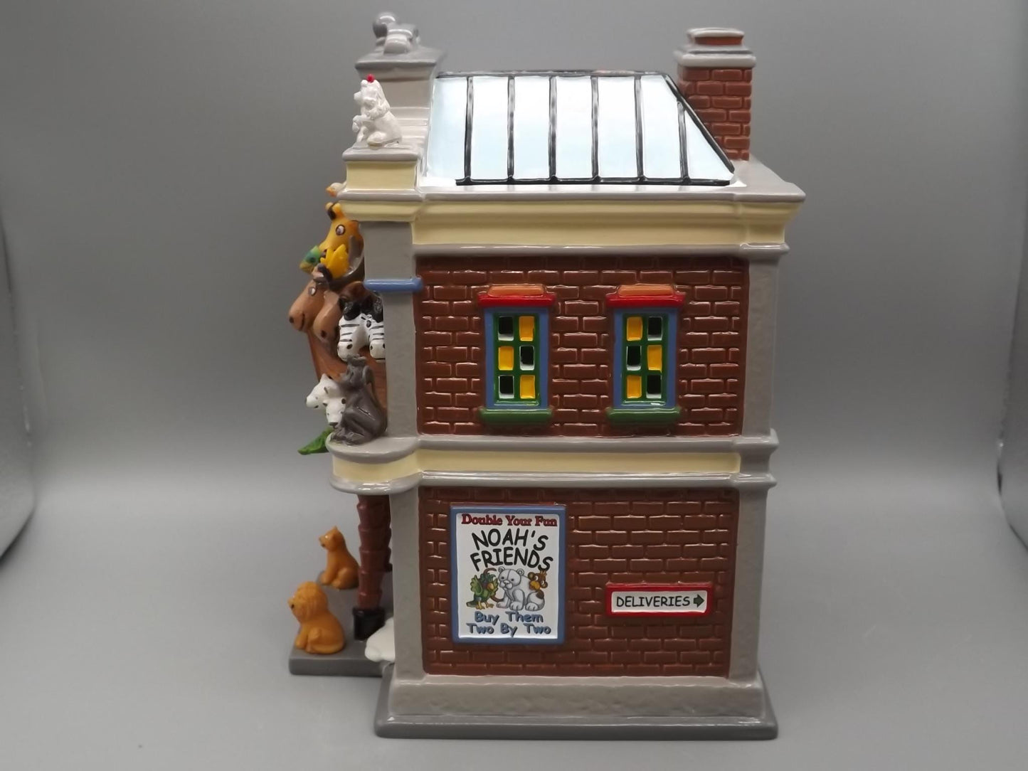 Vintage Snow Village "Noah's Stuffed Animals" Illuminated building seasonal display village scene. With box.