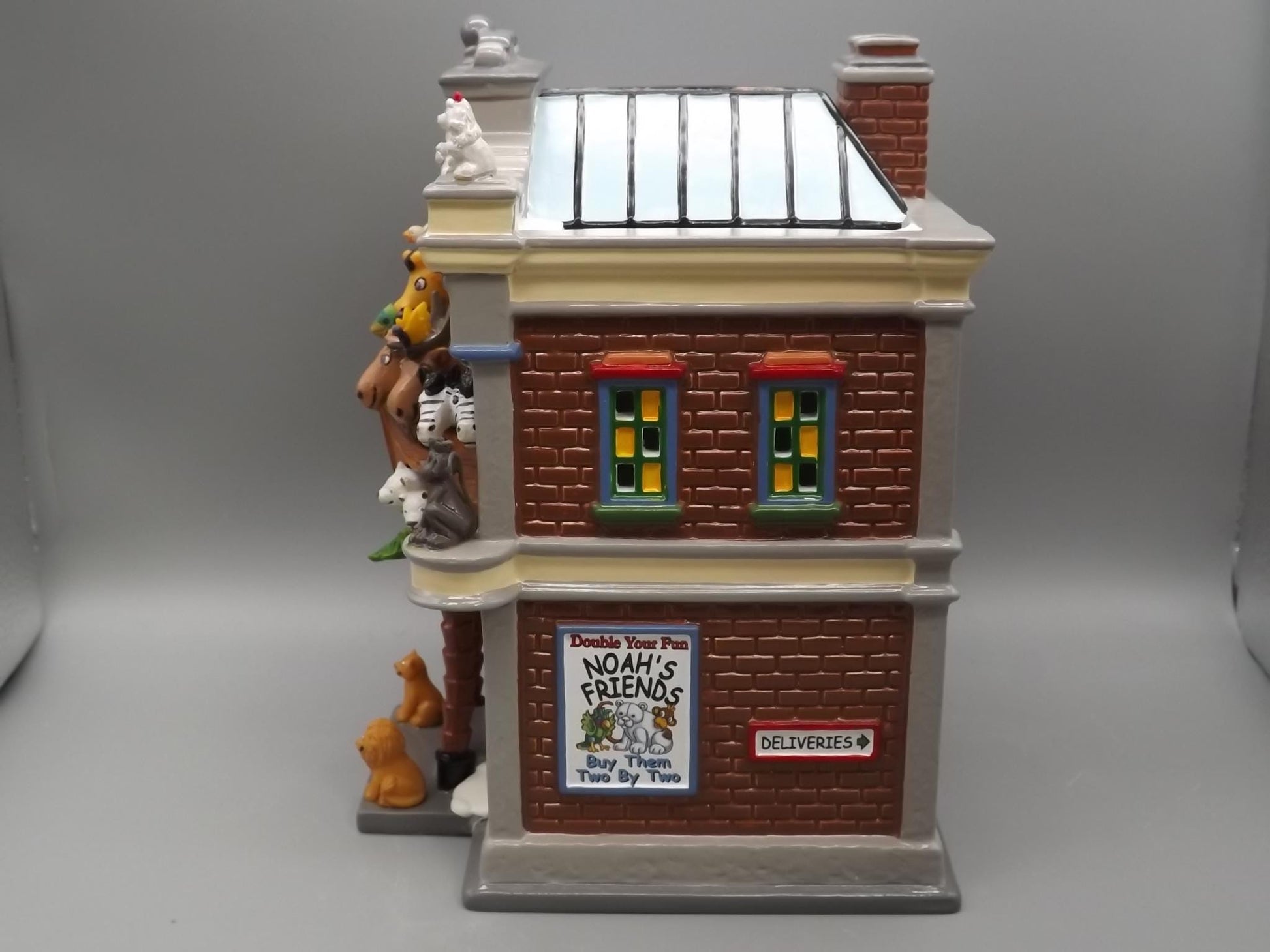 Vintage Snow Village "Noah's Stuffed Animals" Illuminated building seasonal display village scene. With box.