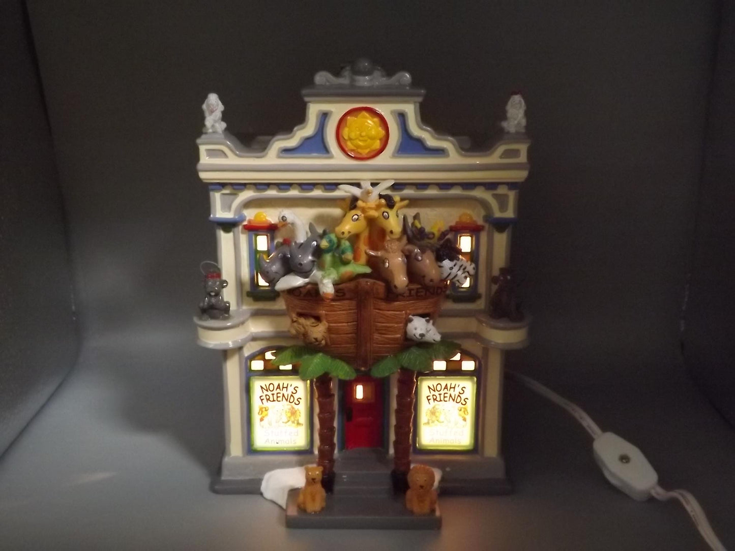 Vintage Snow Village "Noah's Stuffed Animals" Illuminated building seasonal display village scene. With box.