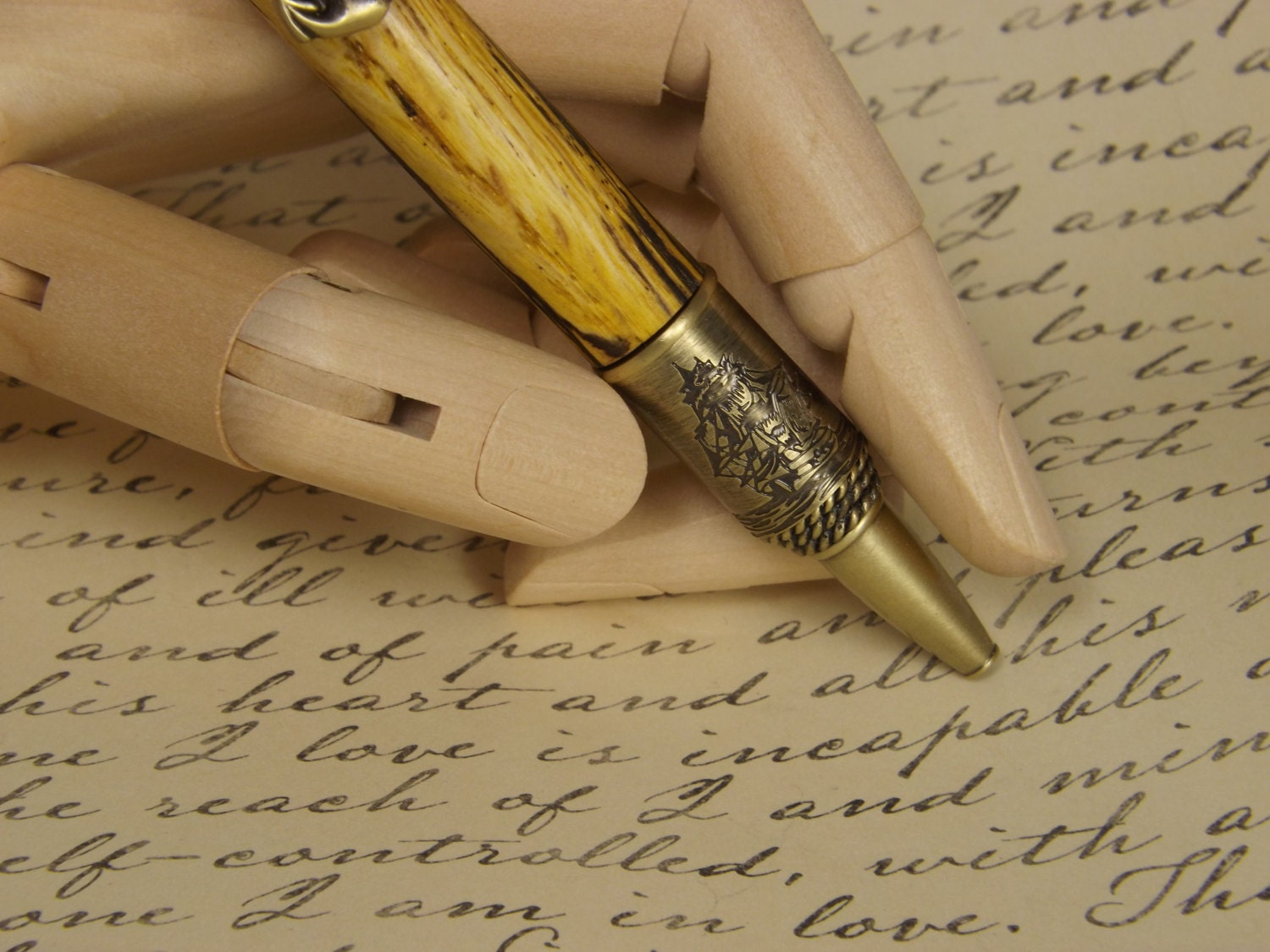 Handmade nautical pen, antique bronze with a dyed and stabilized tiger oak wood body.