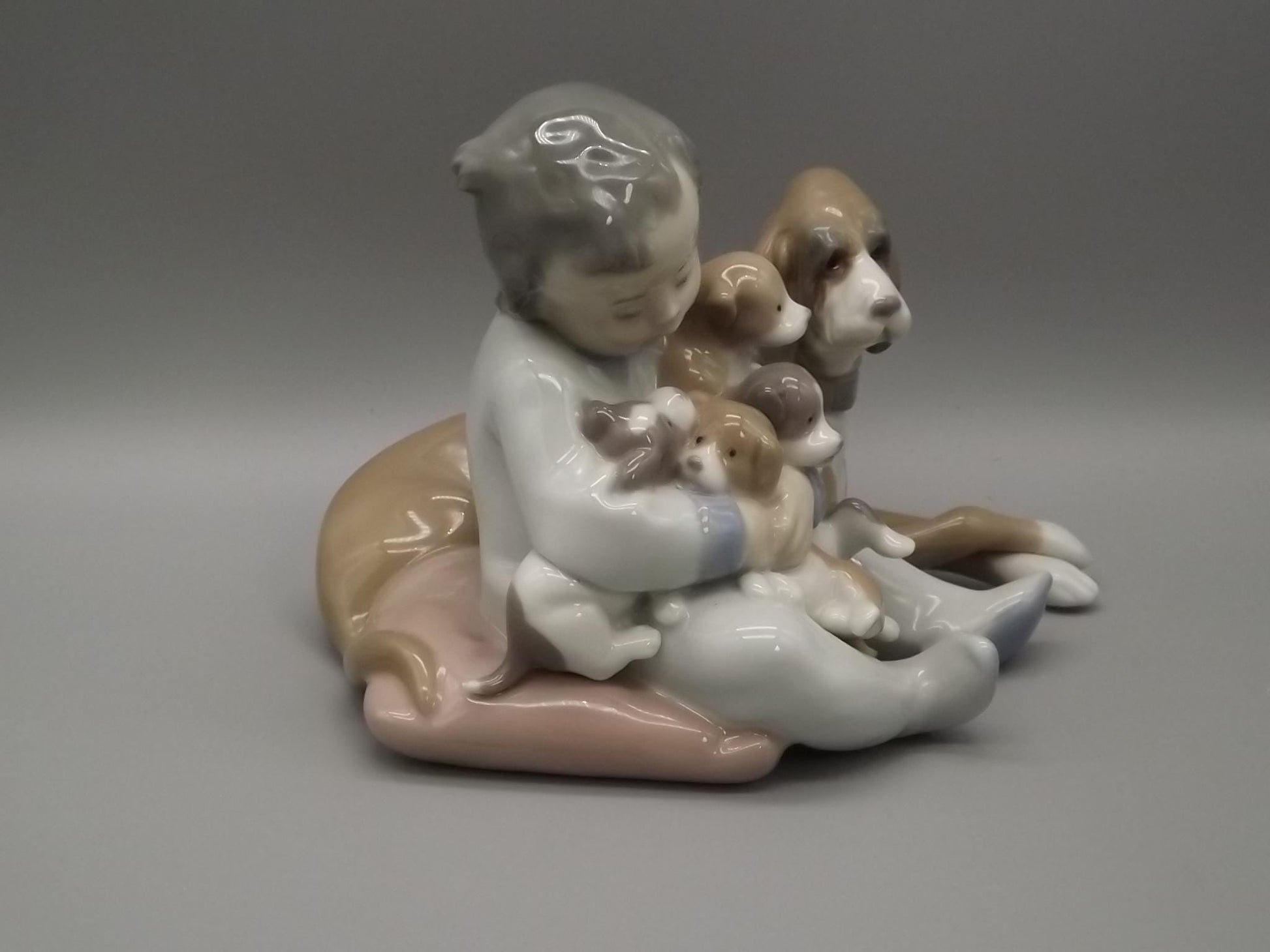 Vintage Lladro "New Playmates" Figurine: Boy with Puppies, #5456 (1988, with Box)