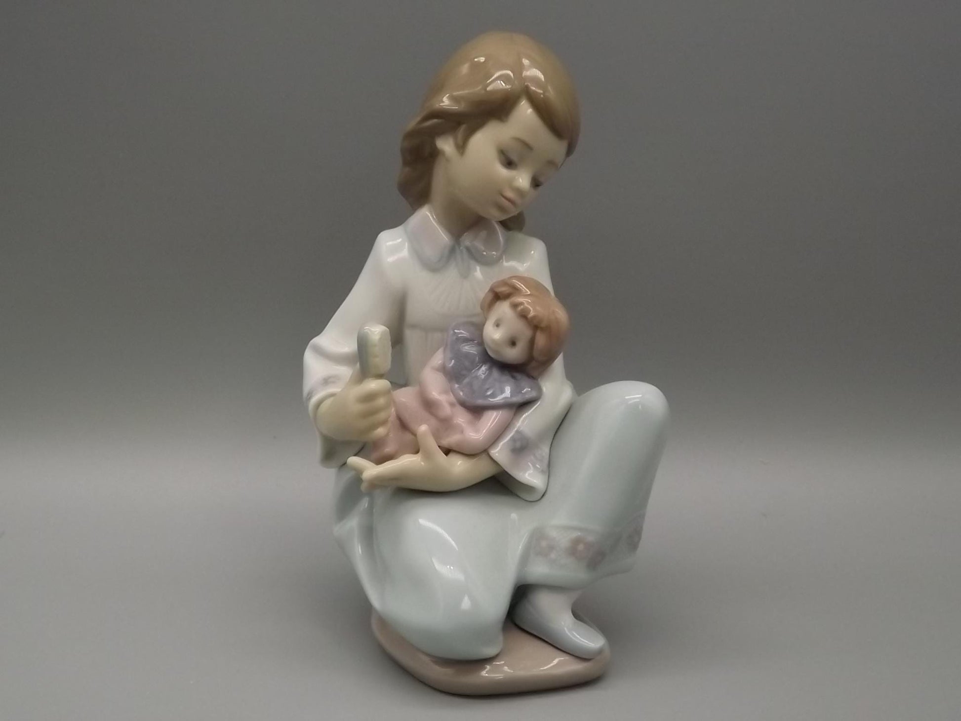 Vintage Lladro "Thoughtful Caress" Figurine: Girl with her doll, #5990 (1993, with Box)