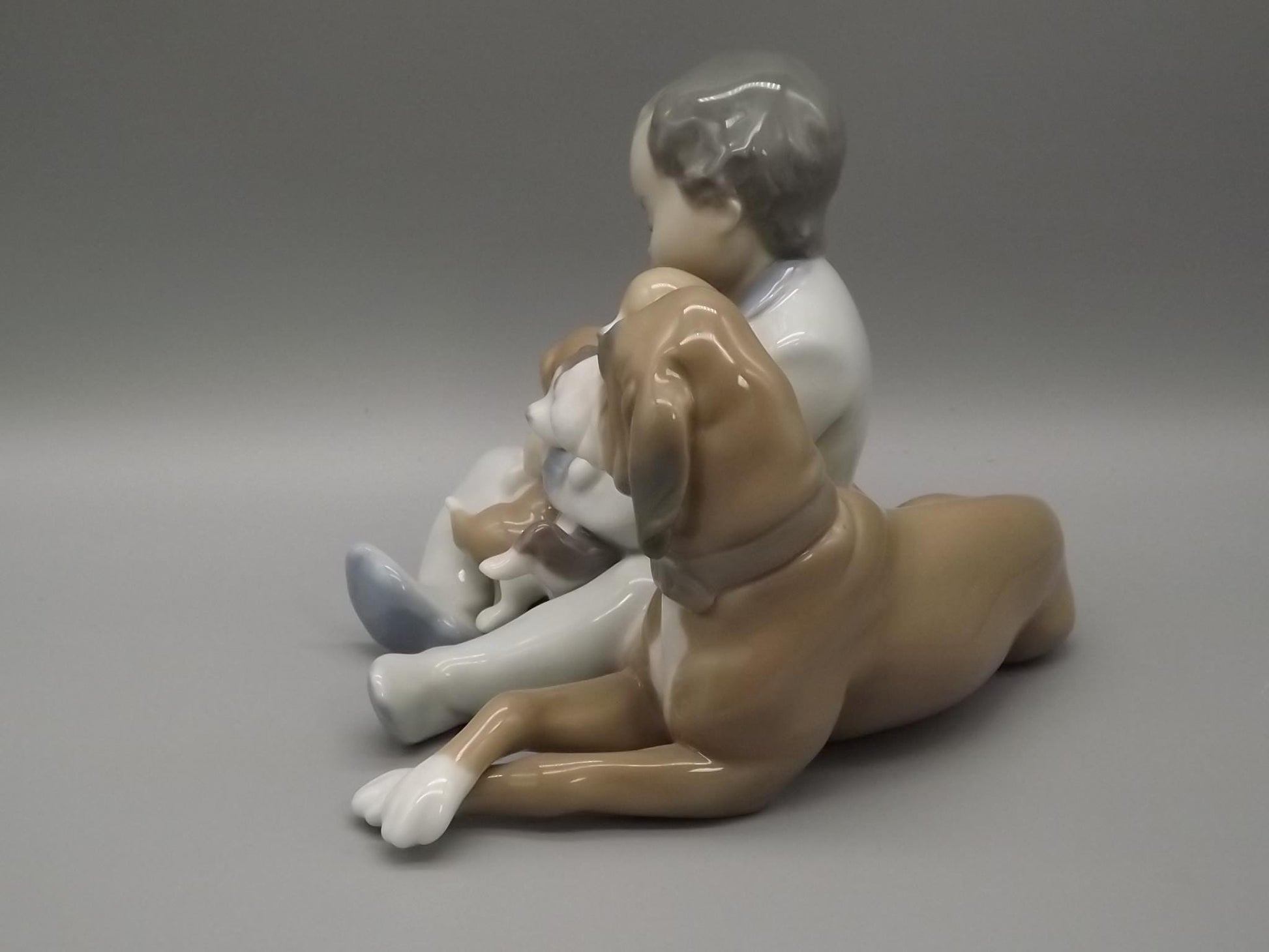 Vintage Lladro "New Playmates" Figurine: Boy with Puppies, #5456 (1988, with Box)