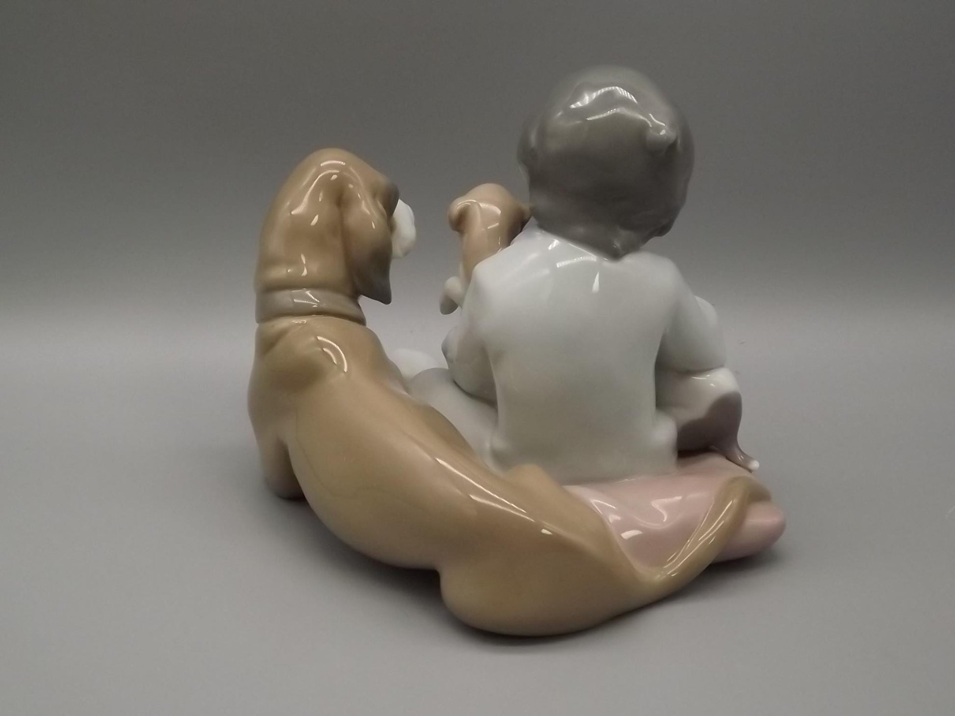 Vintage Lladro "New Playmates" Figurine: Boy with Puppies, #5456 (1988, with Box)