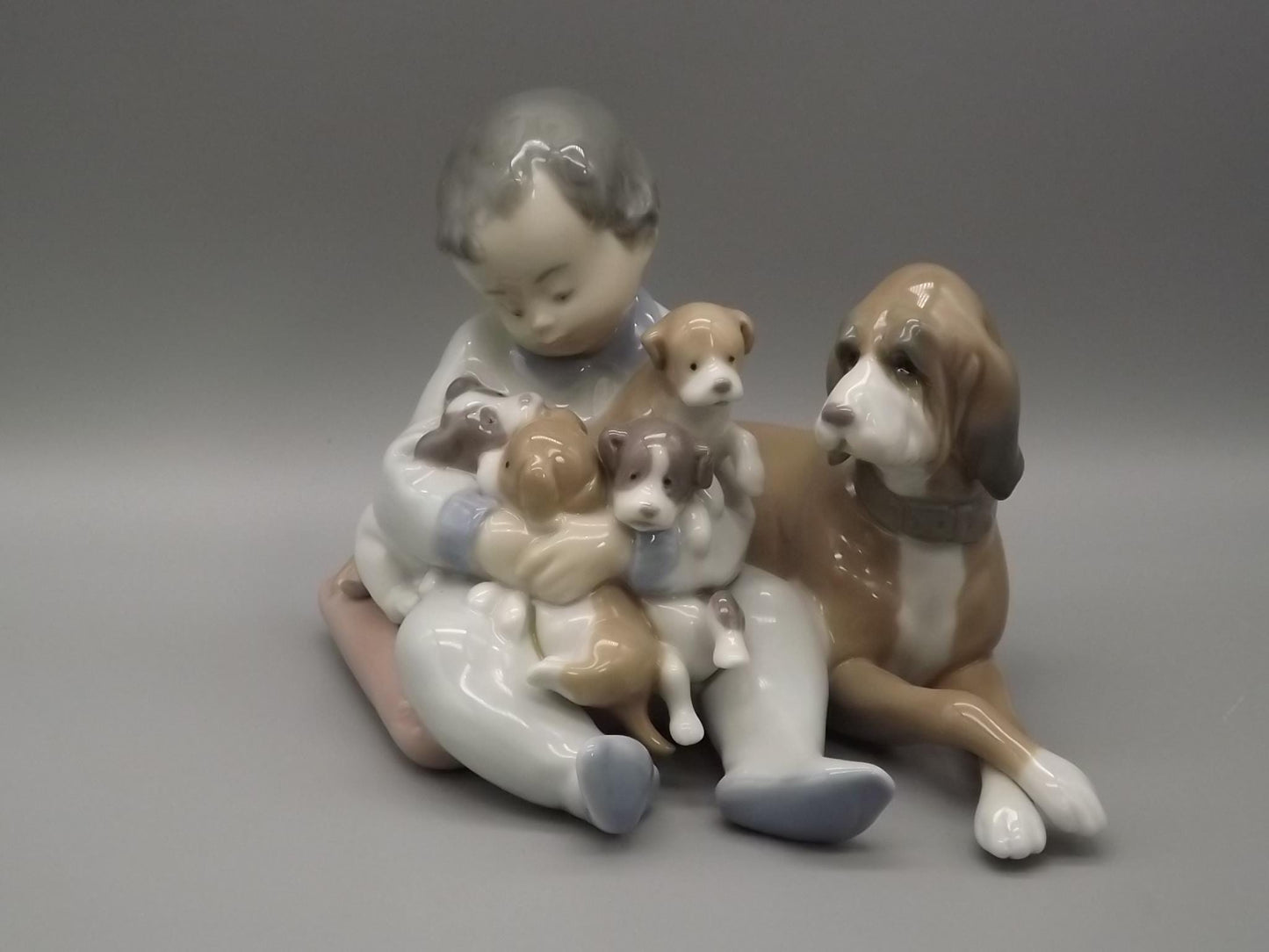 Vintage Lladro "New Playmates" Figurine: Boy with Puppies, #5456 (1988, with Box)