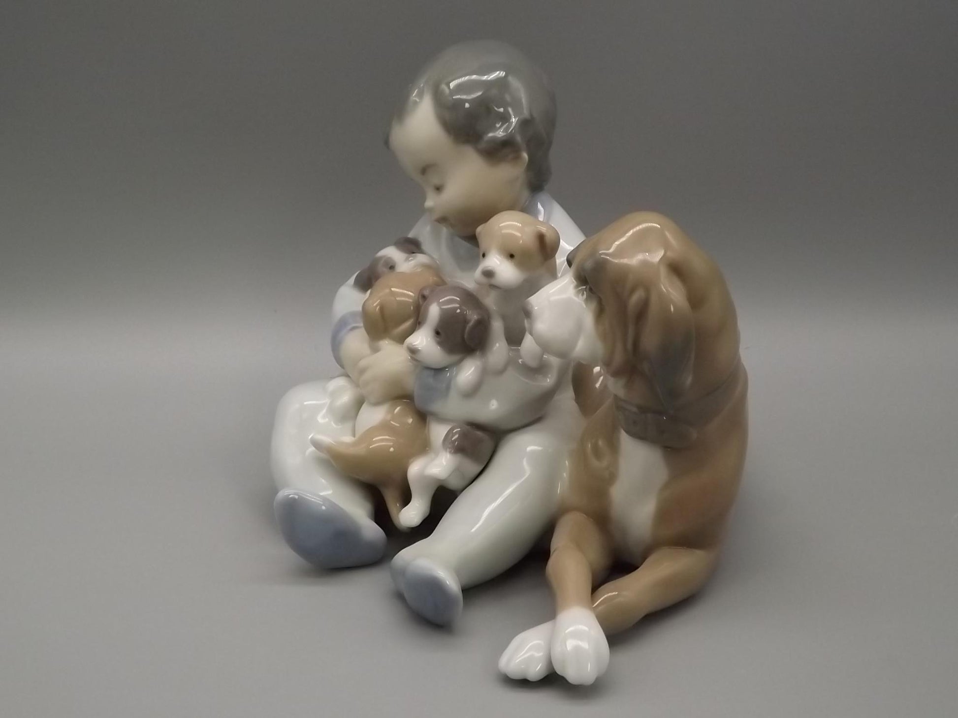 Vintage Lladro "New Playmates" Figurine: Boy with Puppies, #5456 (1988, with Box)