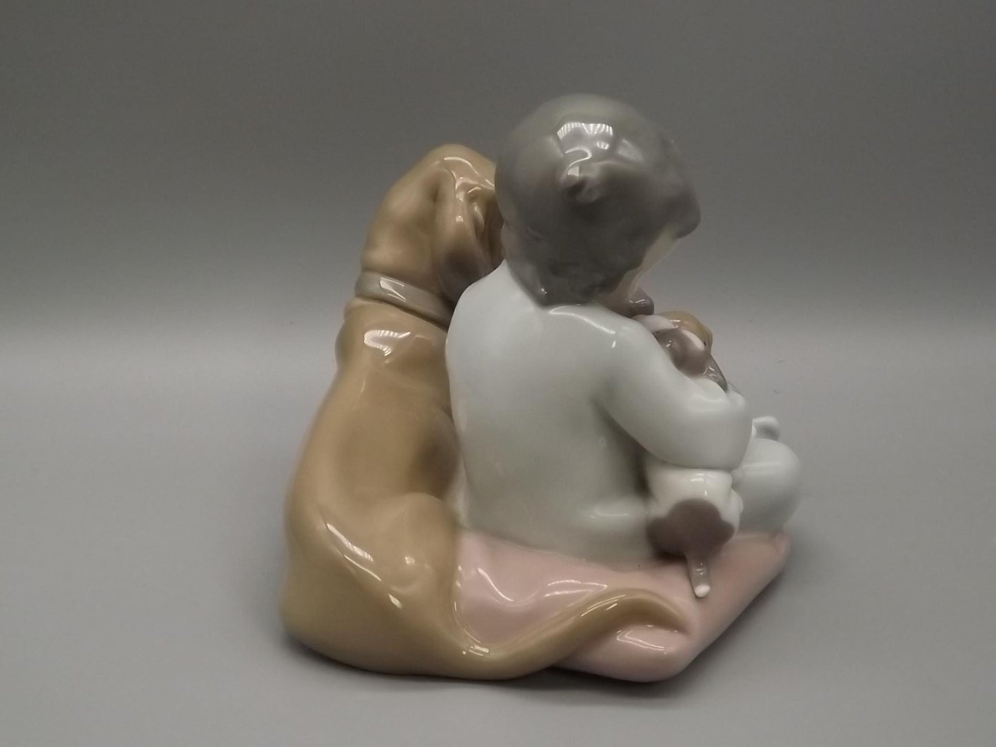 Vintage Lladro "New Playmates" Figurine: Boy with Puppies, #5456 (1988, with Box)