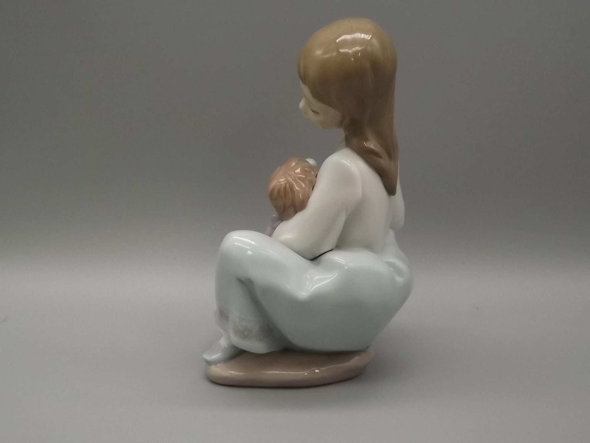 Vintage Lladro "Thoughtful Caress" Figurine: Girl with her doll, #5990 (1993, with Box)