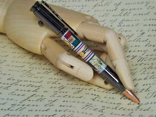 Handmade Bolt Action Pen, Gun Metal mechanism with a Gulf war campaign body. Perfect for the Veteran. This is a stunning military momento.